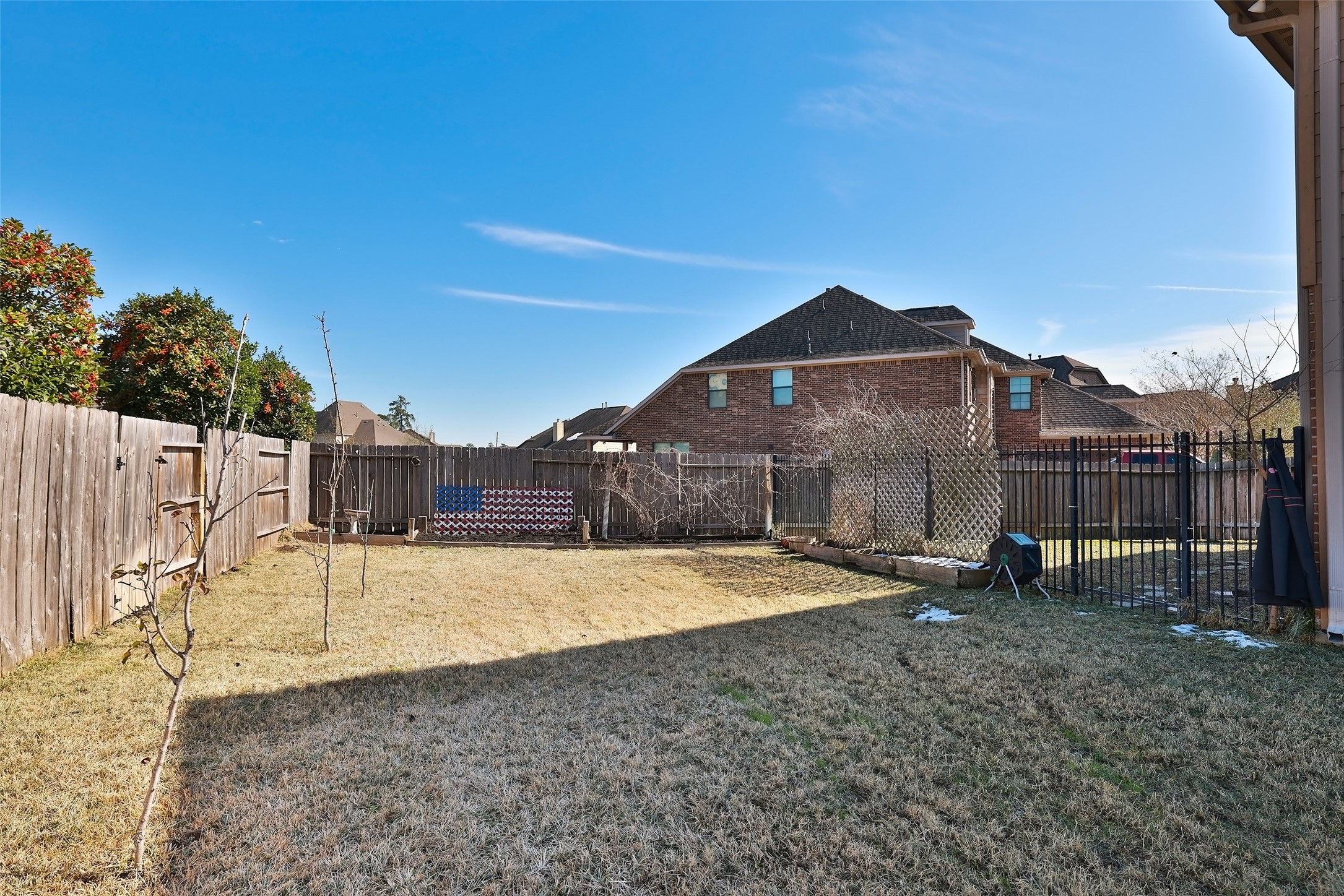 Lots of green space even with the pool. Fenced area great for dogs