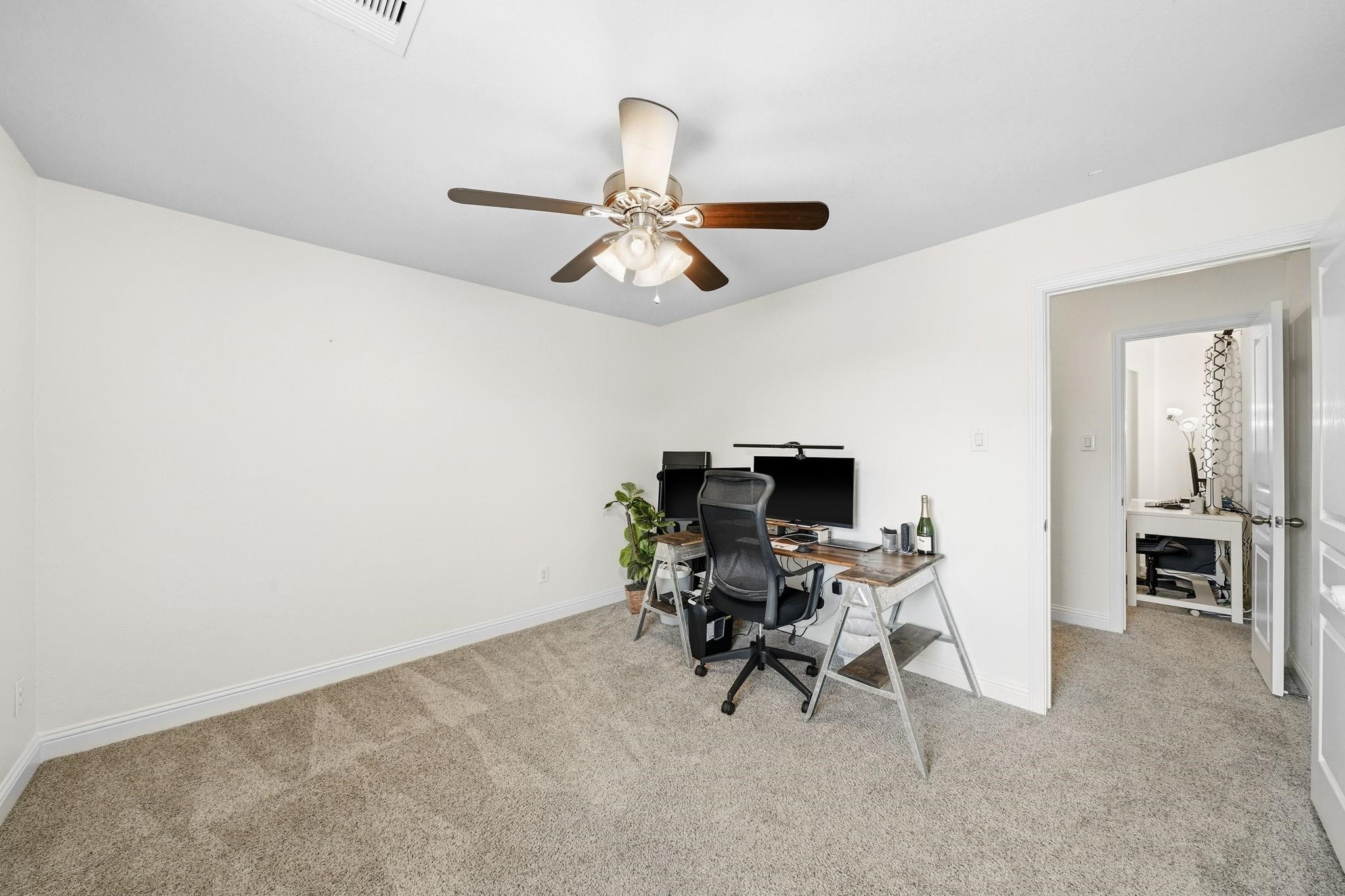 Hidden away for added privacy, this flexible room offers a comfortable and inviting space that can easily adapt to your lifestyle, whether as a study, fitness room, library or personal lounge.