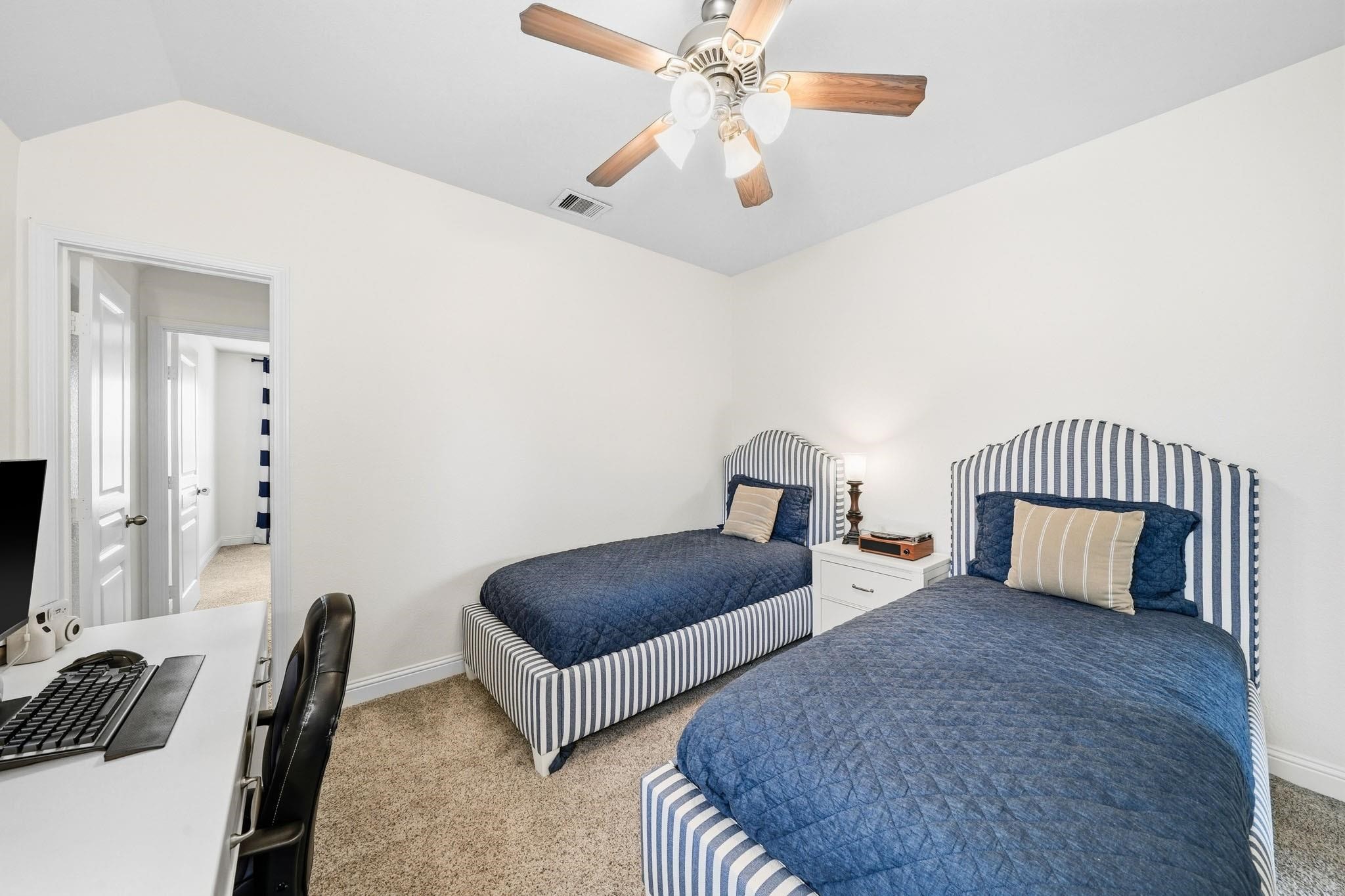 Whether welcoming the morning sun or creating a restful evening escape, this bedroom feels comfortable, private and relaxing.