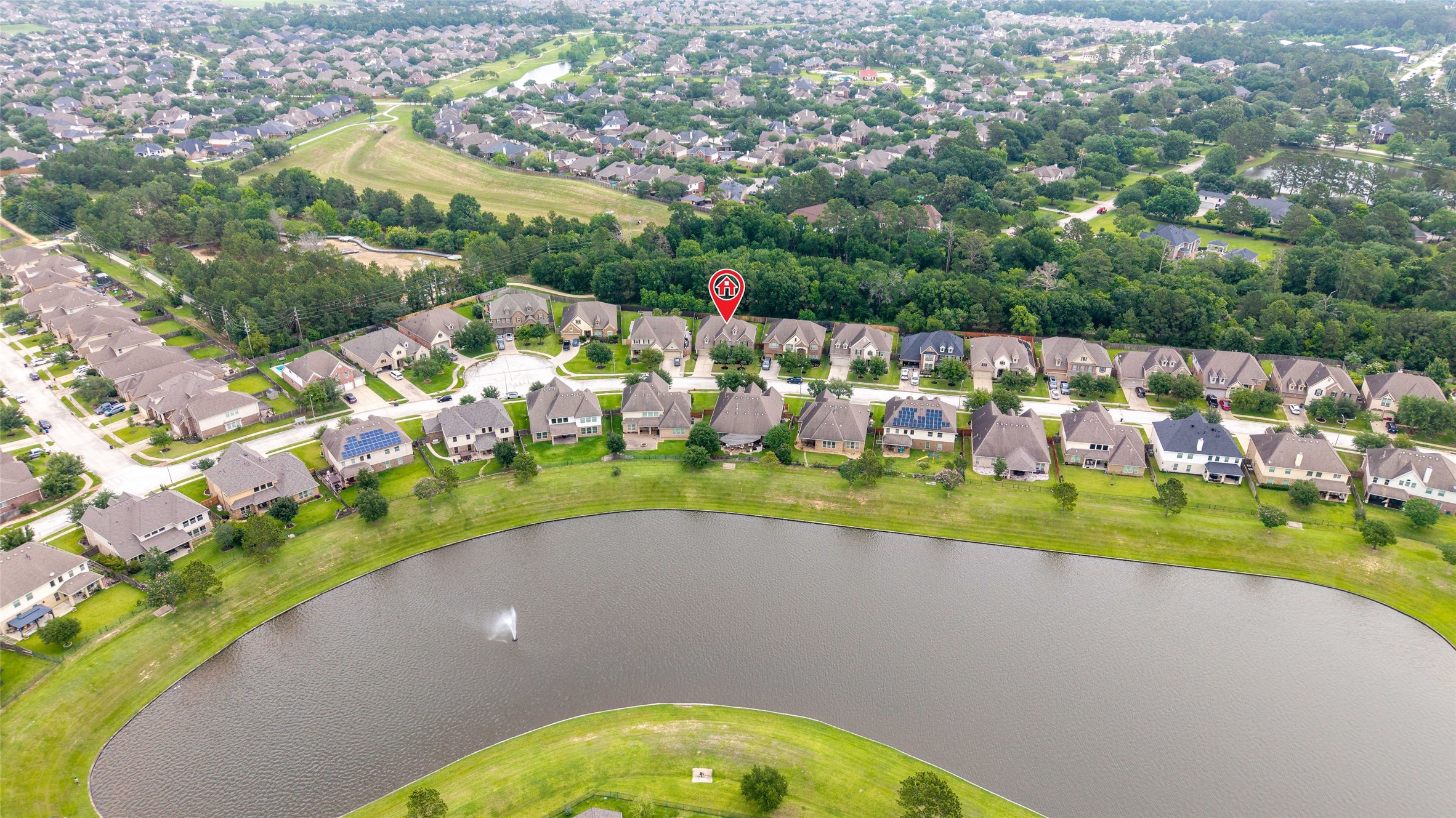 Just steps away from the beautiful neighborhood lake.