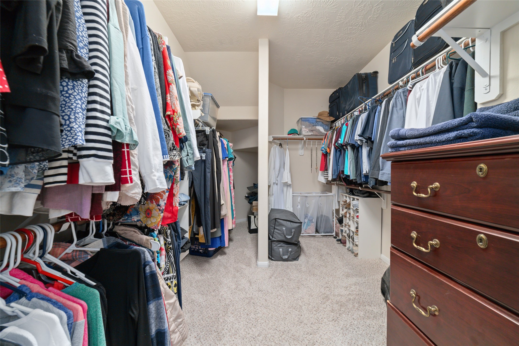 The huge, walk in primary closet offers abundant space and storage.