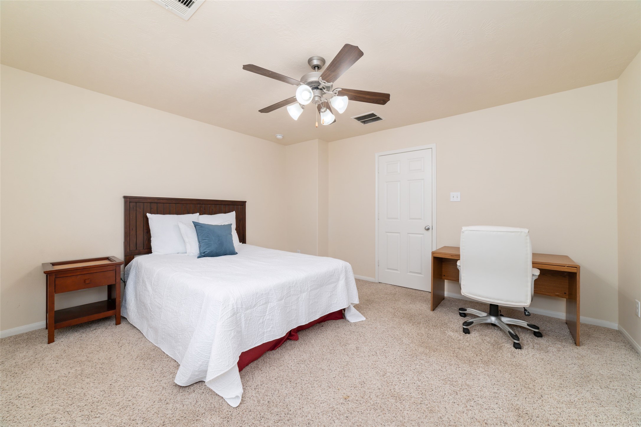The fourth upstairs bedroom.