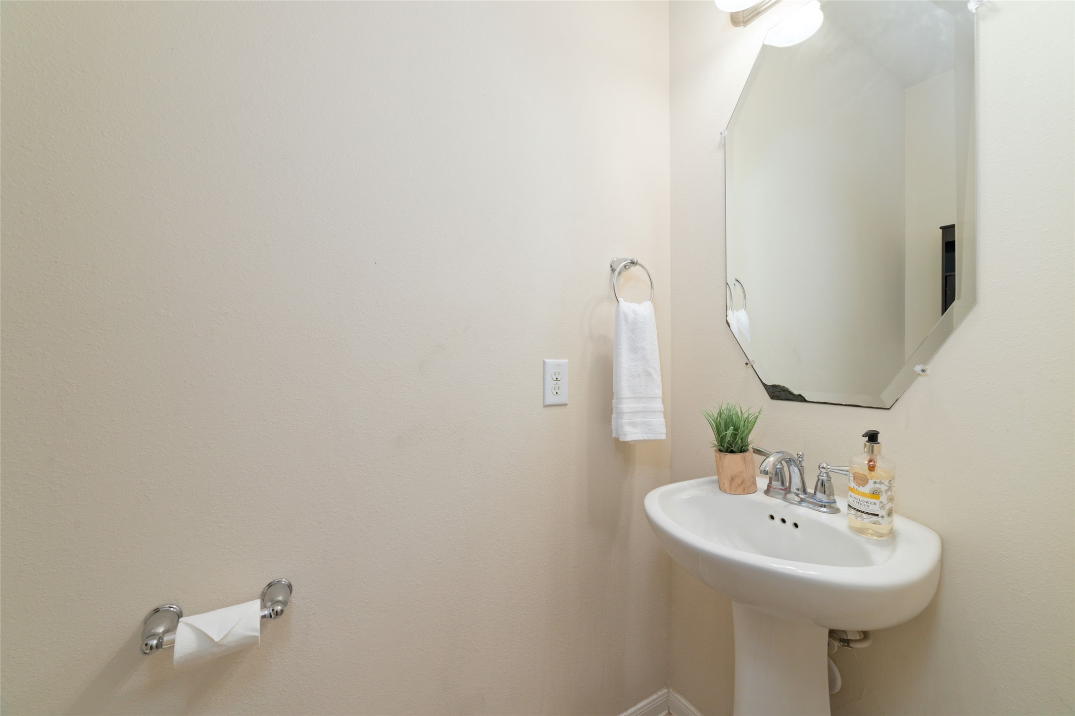 Half bathroom downstairs for guests.