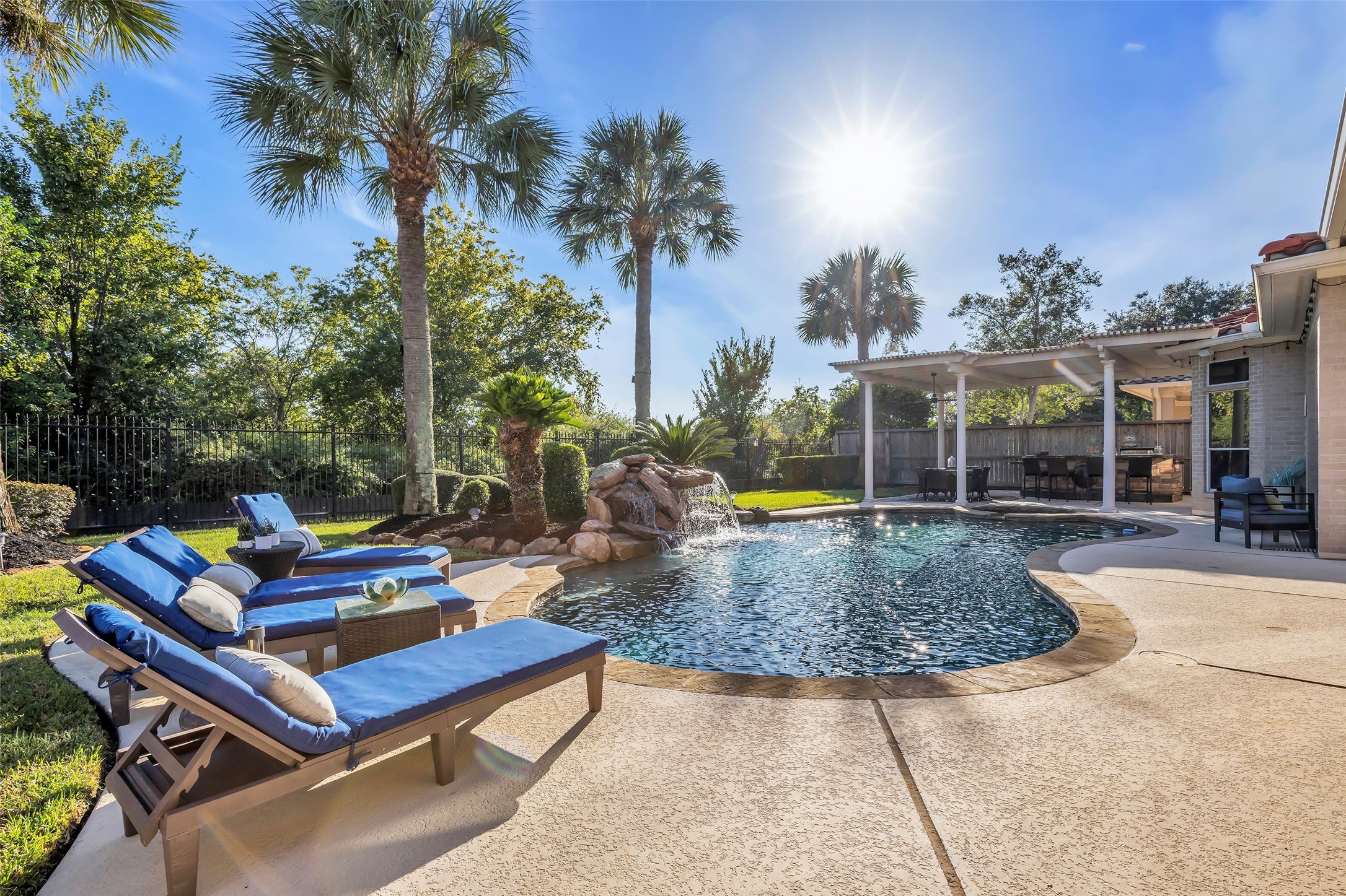 A backyard oasis, with a sparkling swimming pool and spa, an undercover patio, and a pergola. Backs onto George Bush Park, no back neighbors.