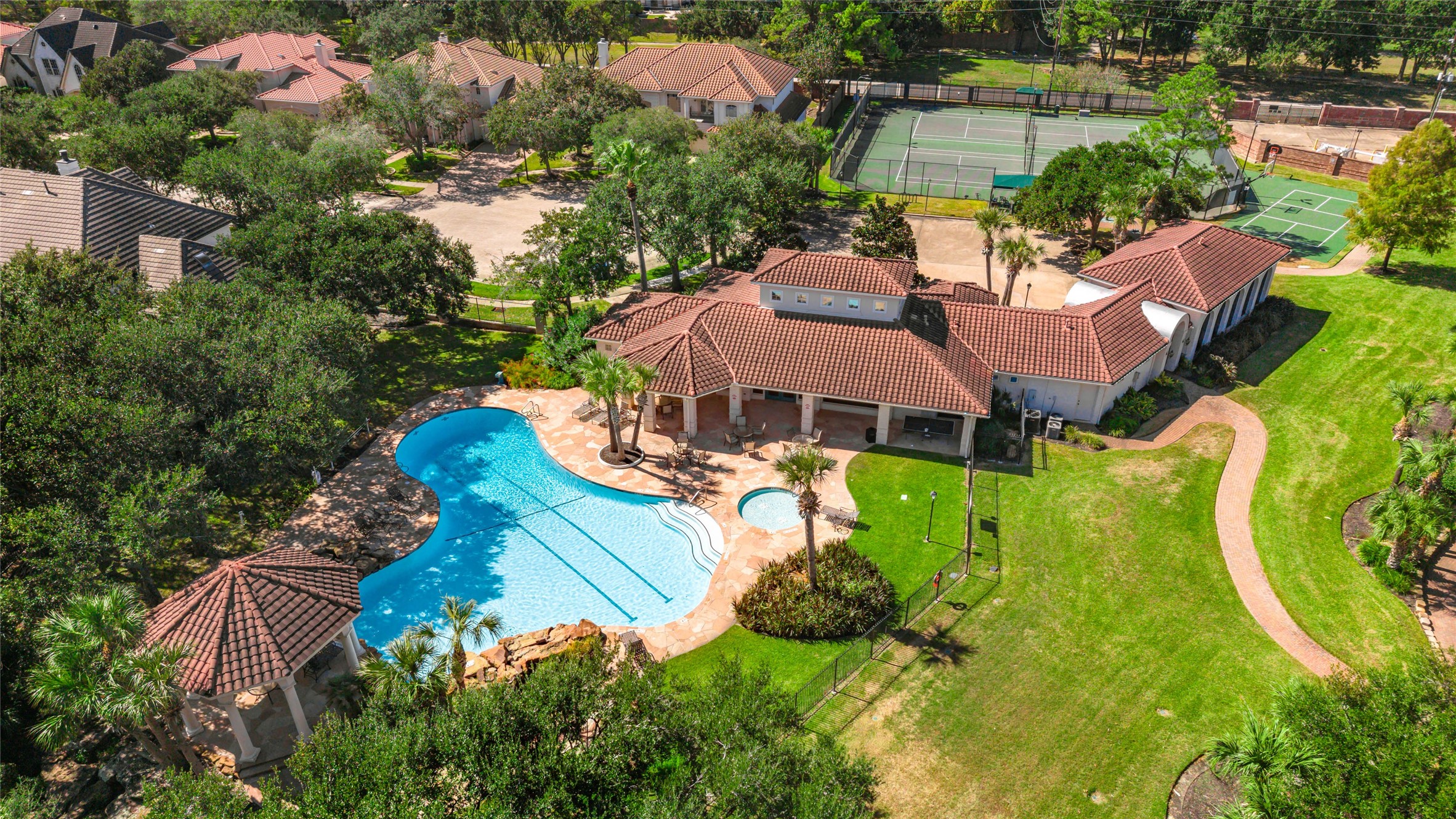 Community amenities include a swimming pool, and tennis courts.