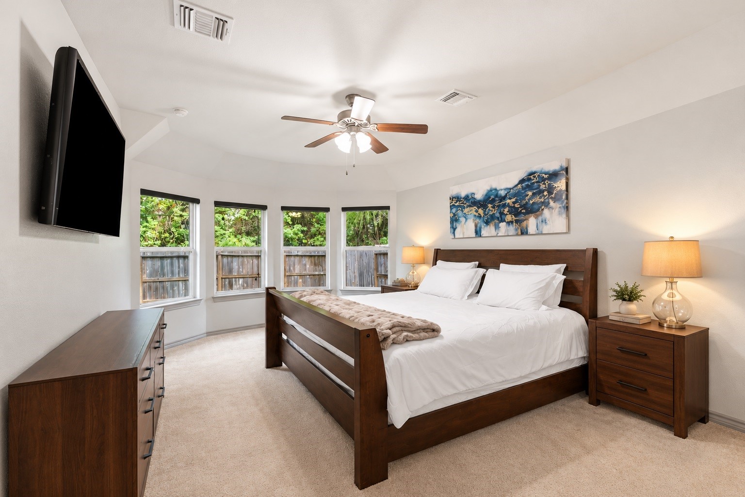 Virtually staged  Furniture and lamps were altered or digitally added.