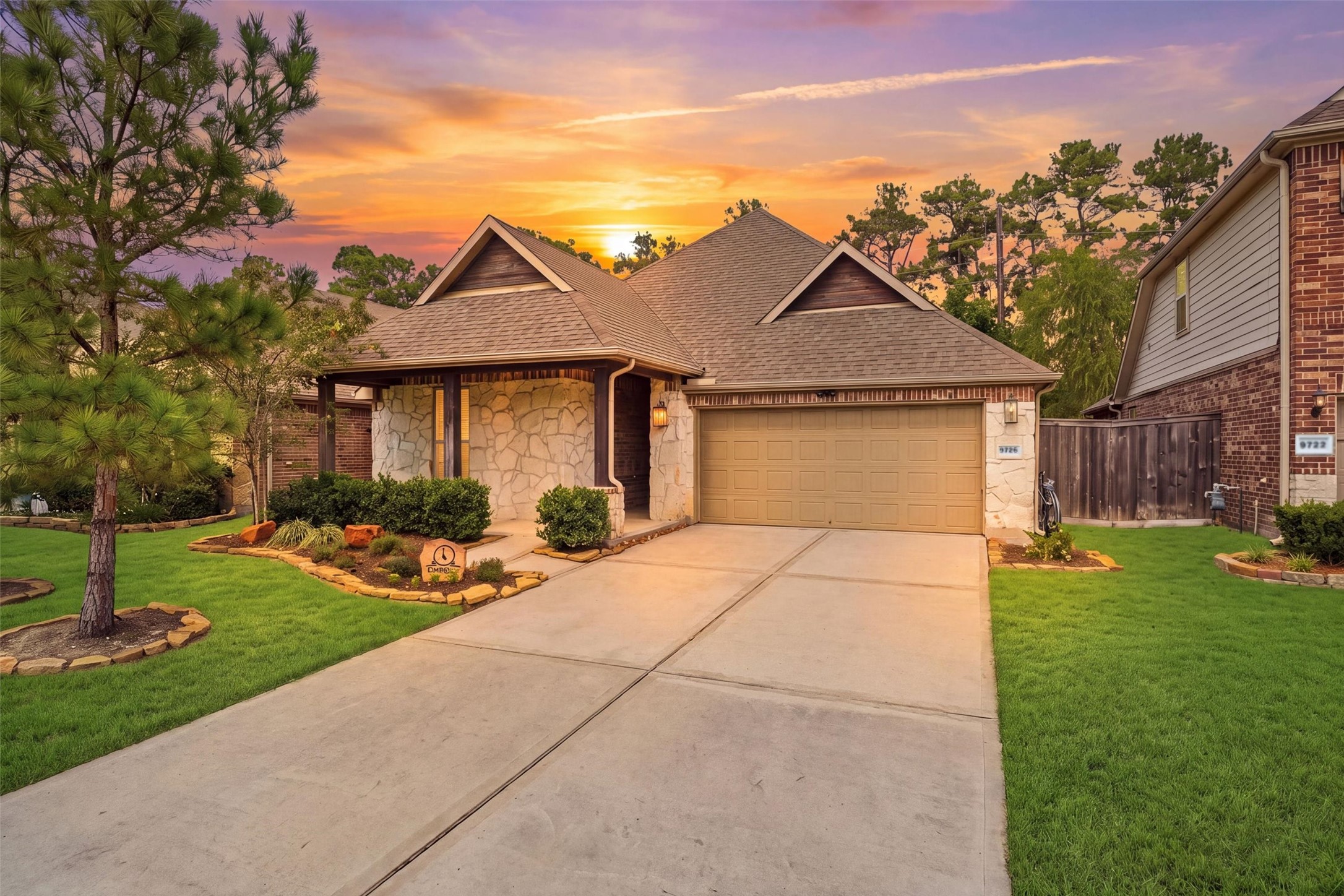 Stunning twilight view showcasing the home's attractive exterior, inviting entryway, and beautifully landscaped front yard.