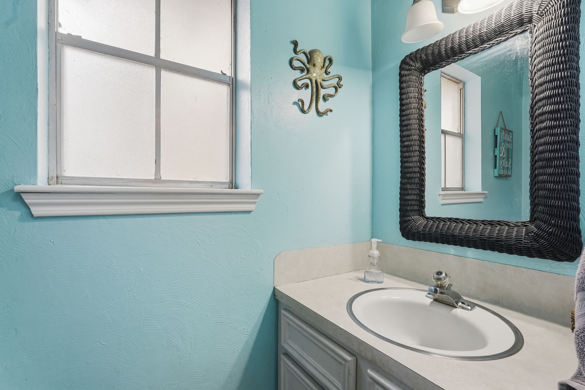 Bright and inviting half bathroom on the first floor!