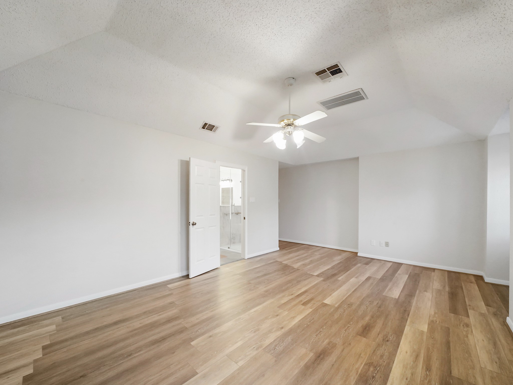 Primary room! This is the owners suite. Has upgraded flooring and has ample space.