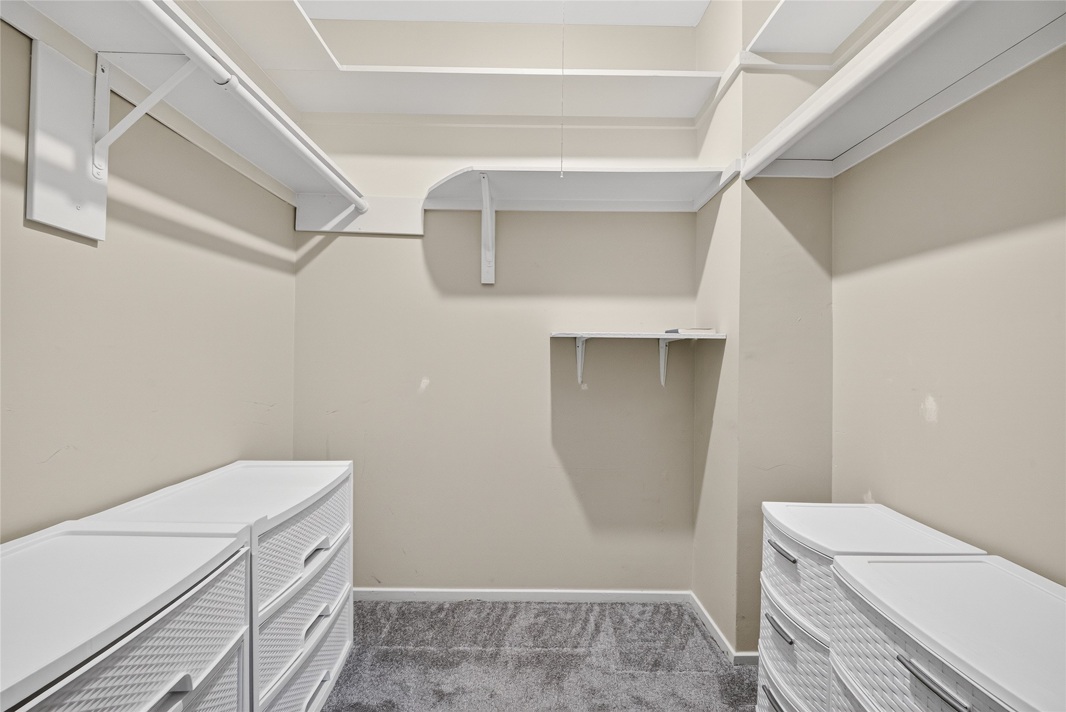 Primary Bedroom walk-in closet