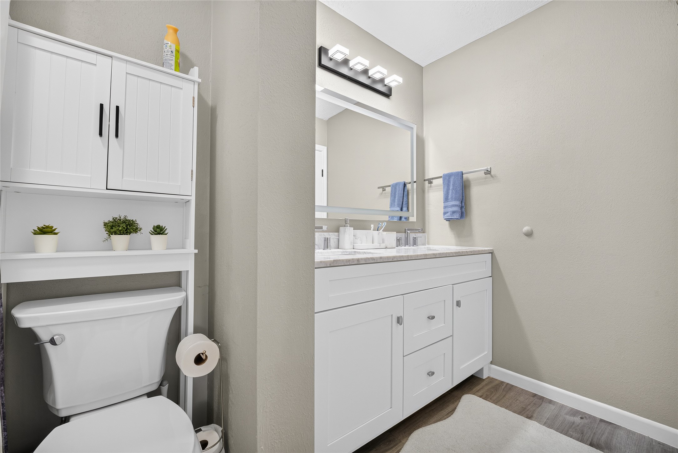 Upstairs shared bathroom - opens to hallway and primary Bedroom.