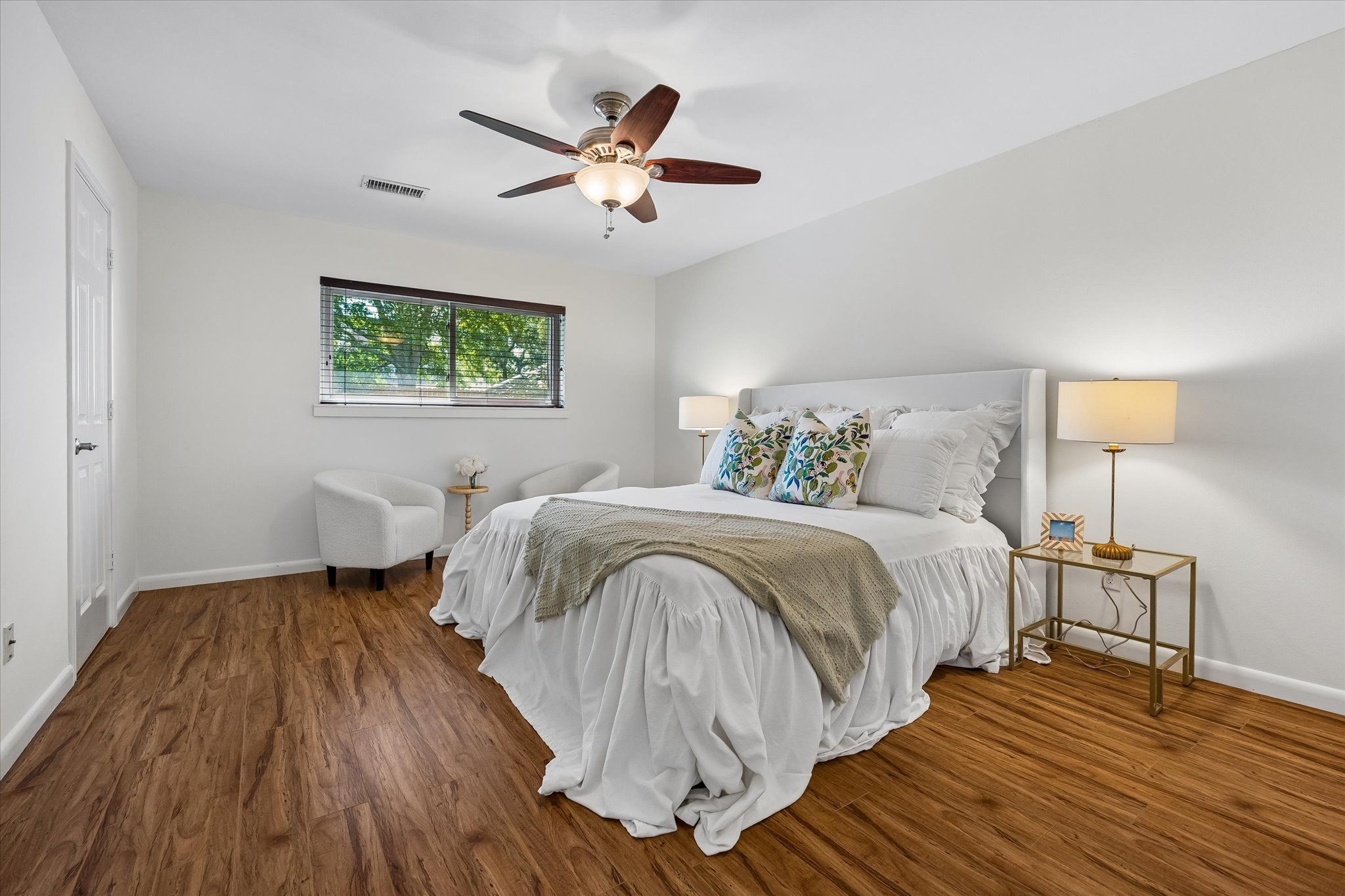 The primary suite offers a generous layout with plenty of room for a sitting area, plus a massive walk-in closet that provides all the storage space youve been dreaming of.