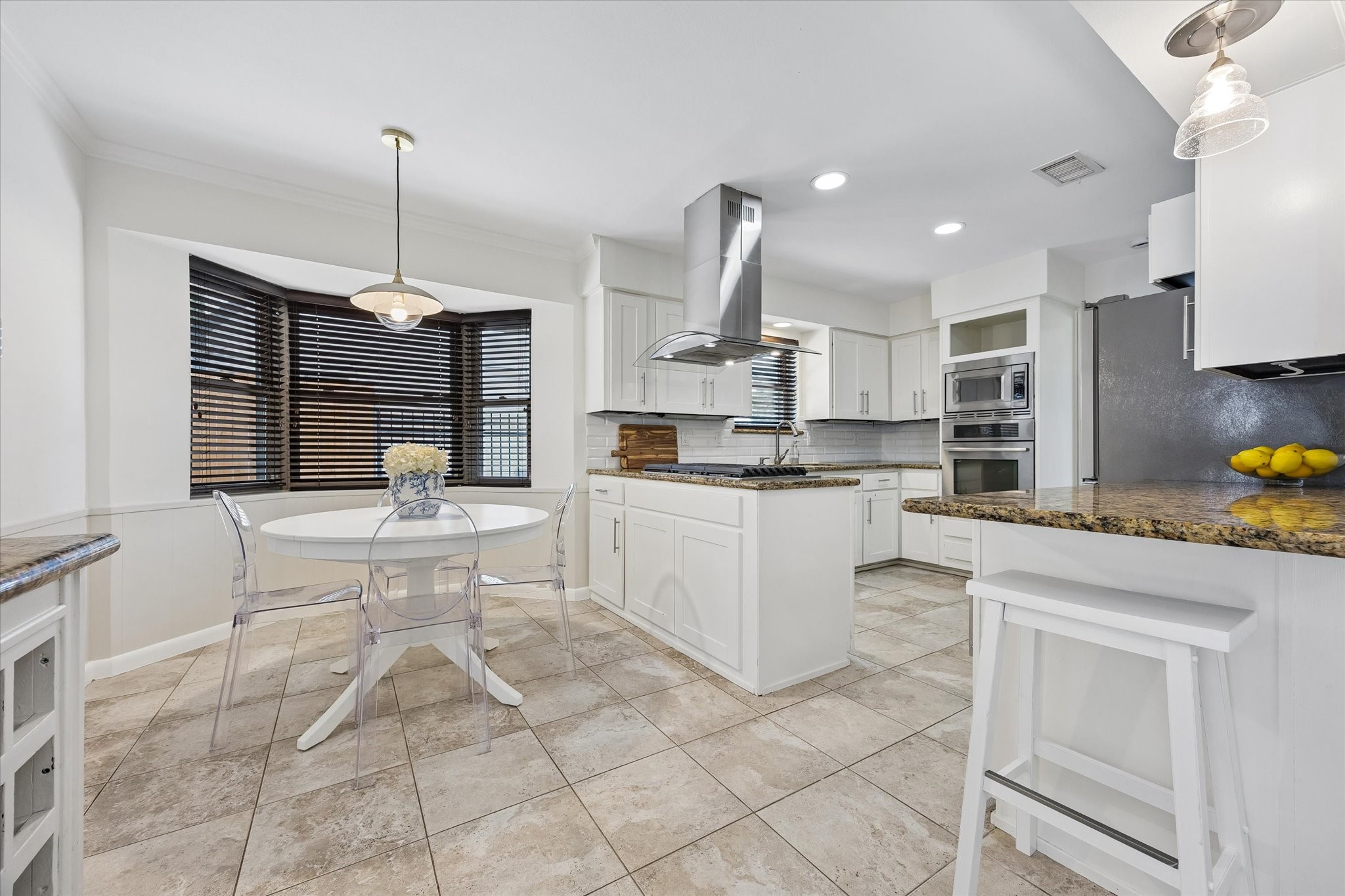 With a smart layout and extensive custom storage, this kitchen is built for organization and easy every day living.