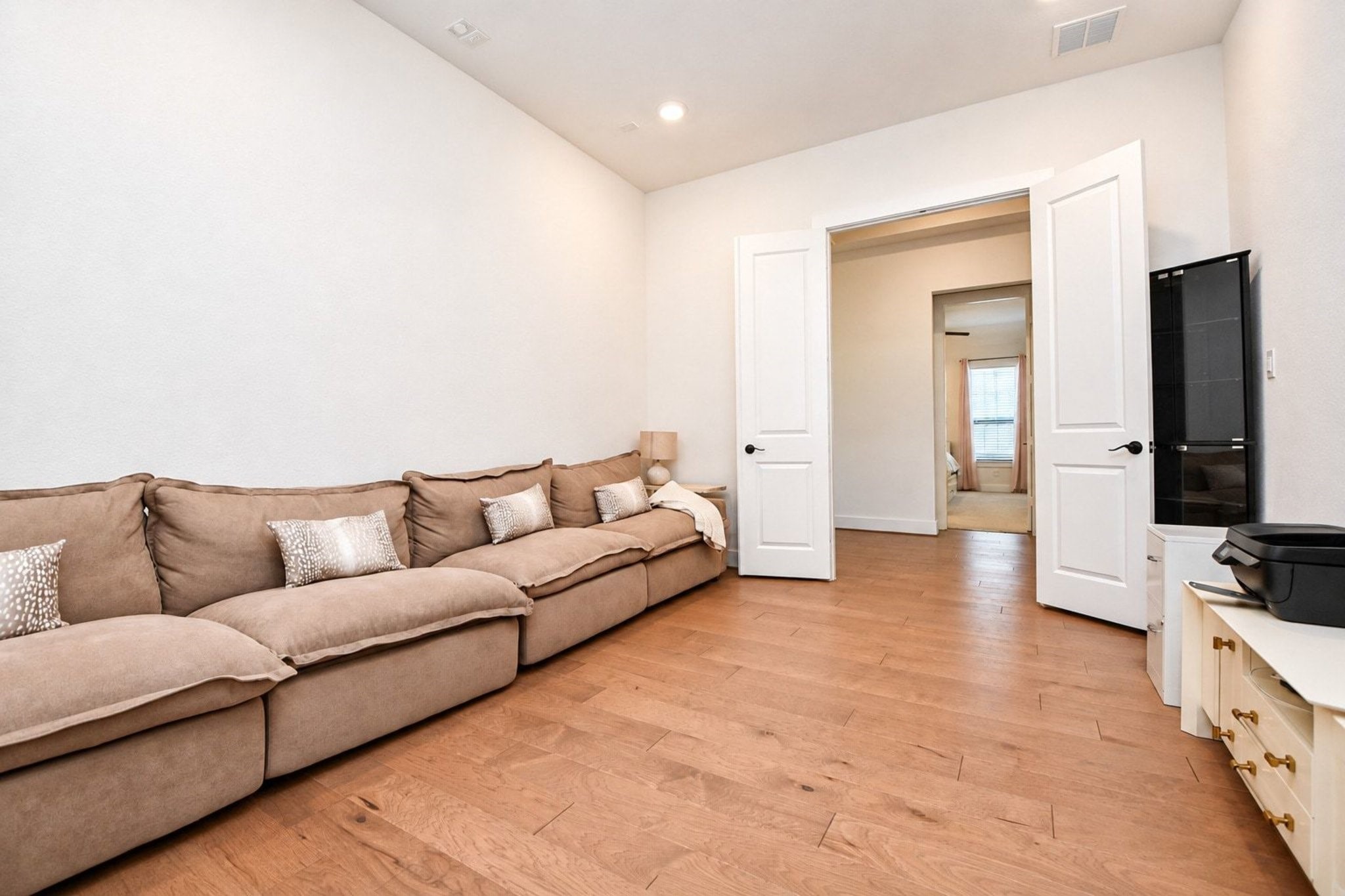 Double doors located on the media room.  Could also be used as an office or playroom.