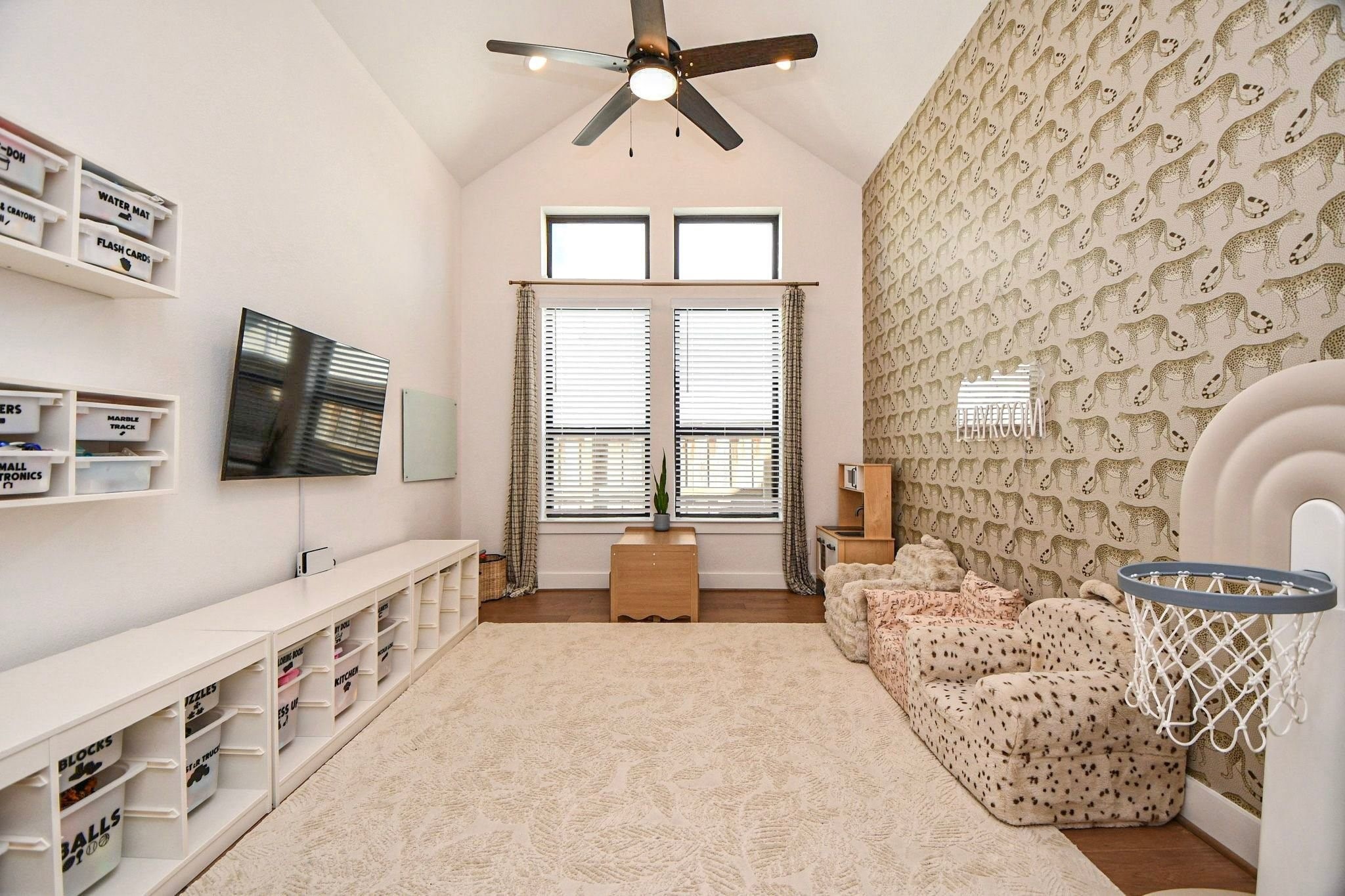 Spacious room with high ceilings and french doors. Can be used as a play room, office or formal dining room.