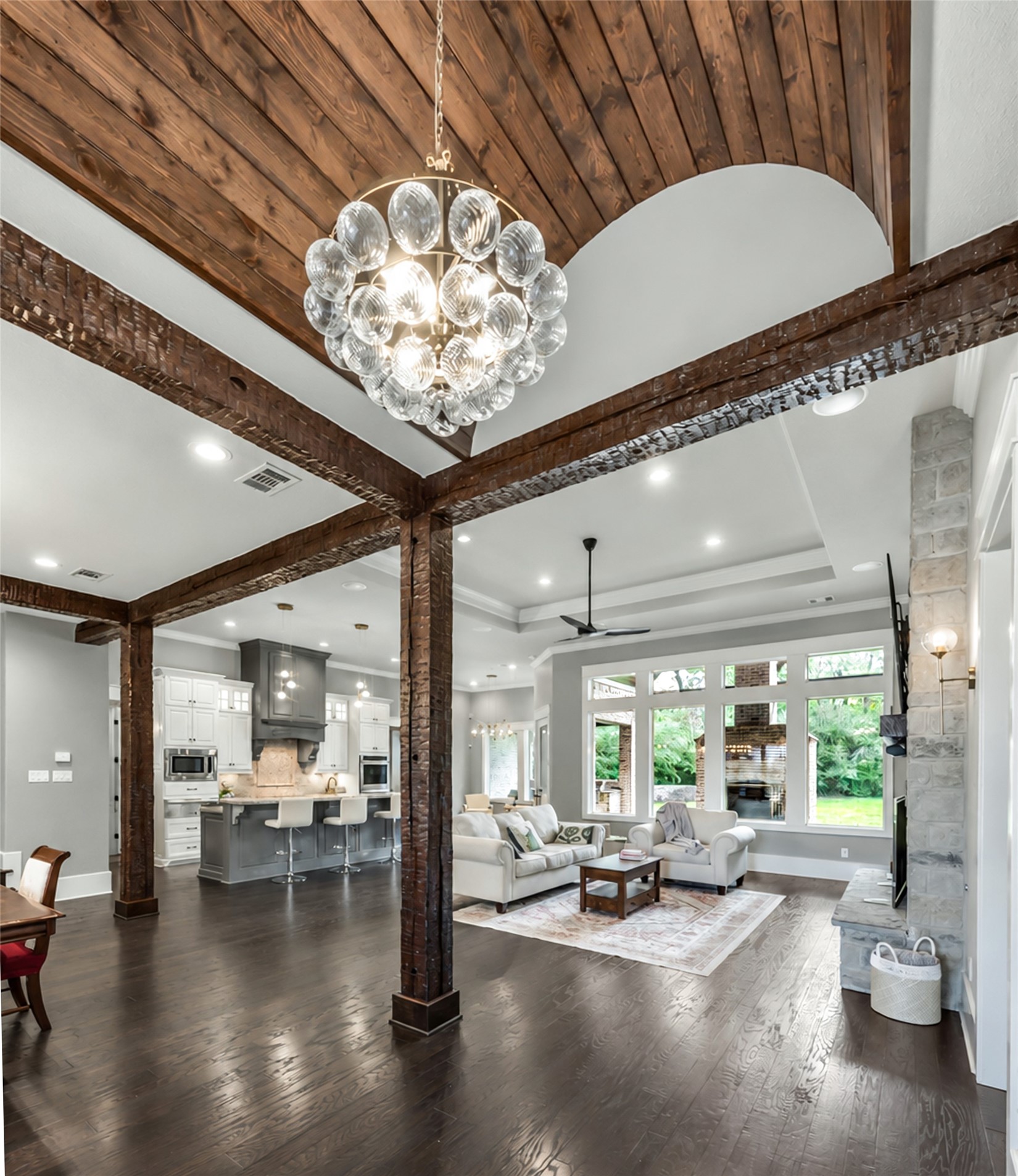 Entry with wood slat arch ceiling