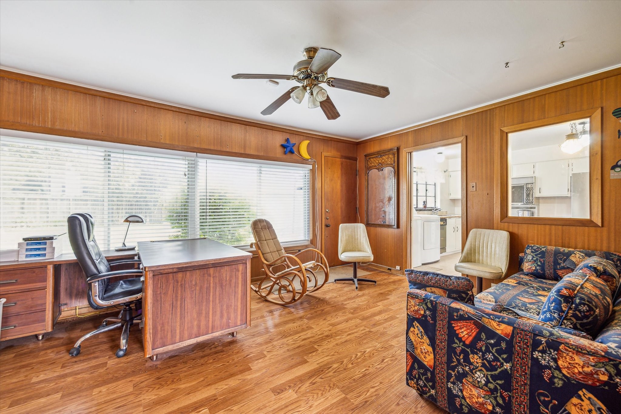 Great study/home office overlooking large fenced backyard.