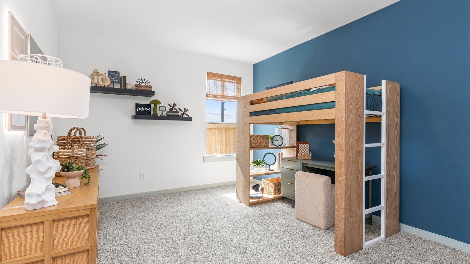 A vibrant bedroom showcasing a neatly made bed, a stylish dresser, and a playful painting that adds charm.