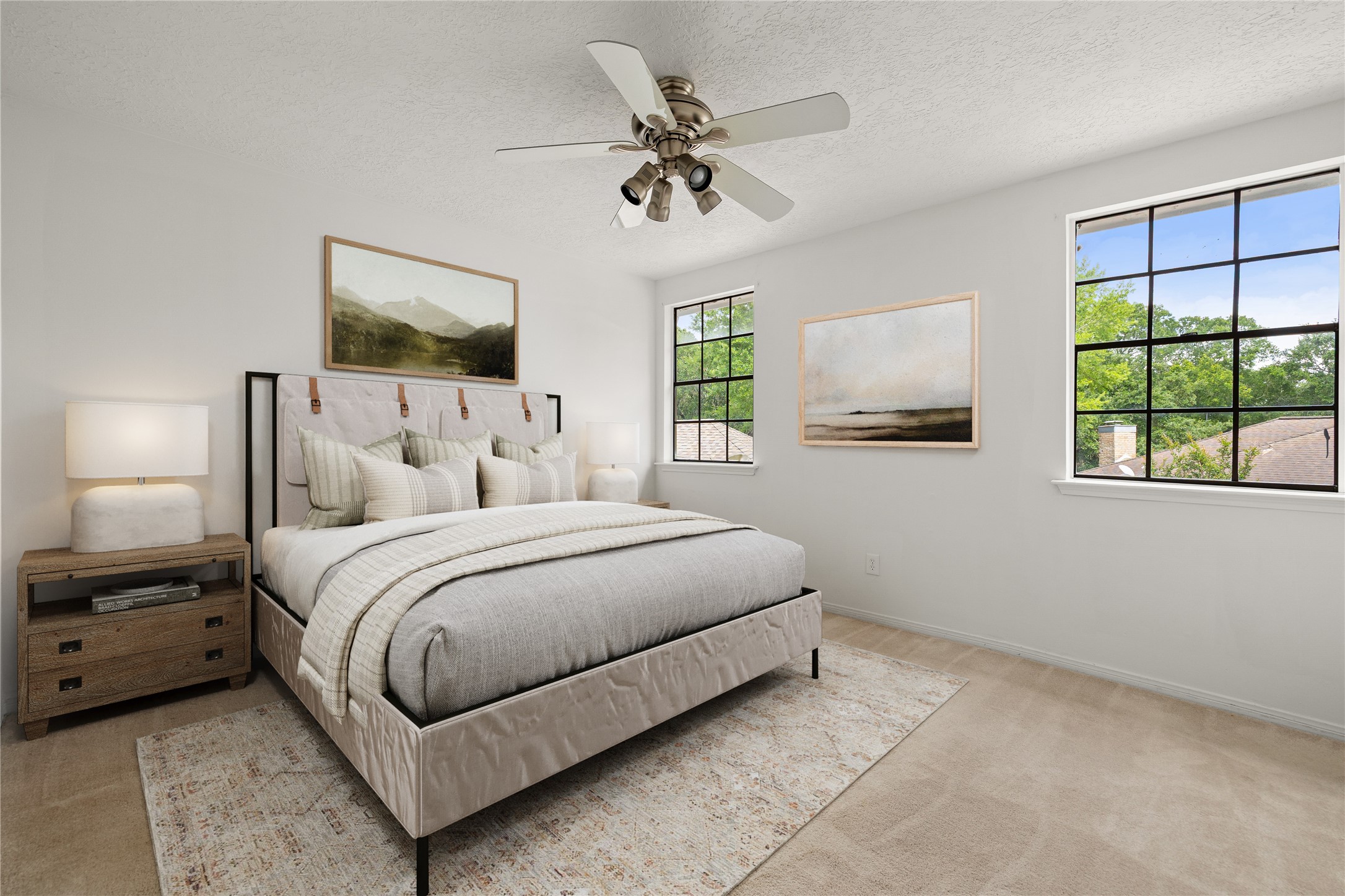 This serene and inviting secondary bedroom offers a perfect retreat for family or guests. The space is anchored by large windows that provides a view of the outdoors while filling the room with natural light. Soft, neutral wall tones and a ceiling fan with integrated lighting creates a comfortable environment year-round. Secondary bedroom has a private vanity and access to a shared secondary bedroom. *Virtually Staged