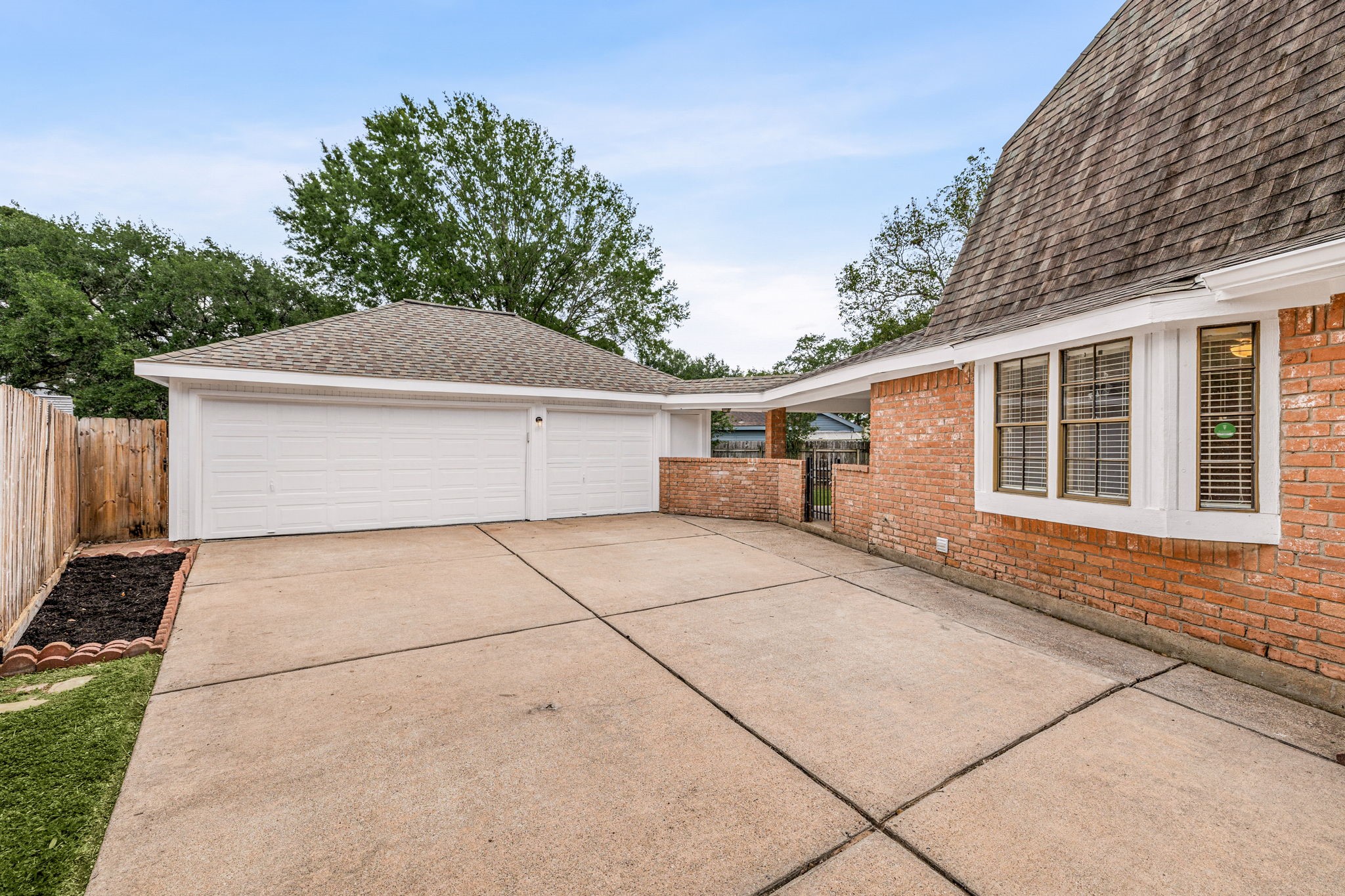 Home features a 3 car garage and an extended private driveway.