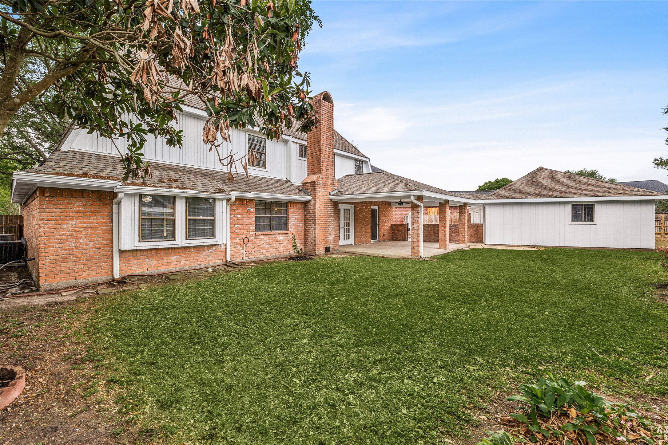 Enjoy your own private slice of nature with the mature landscaping.