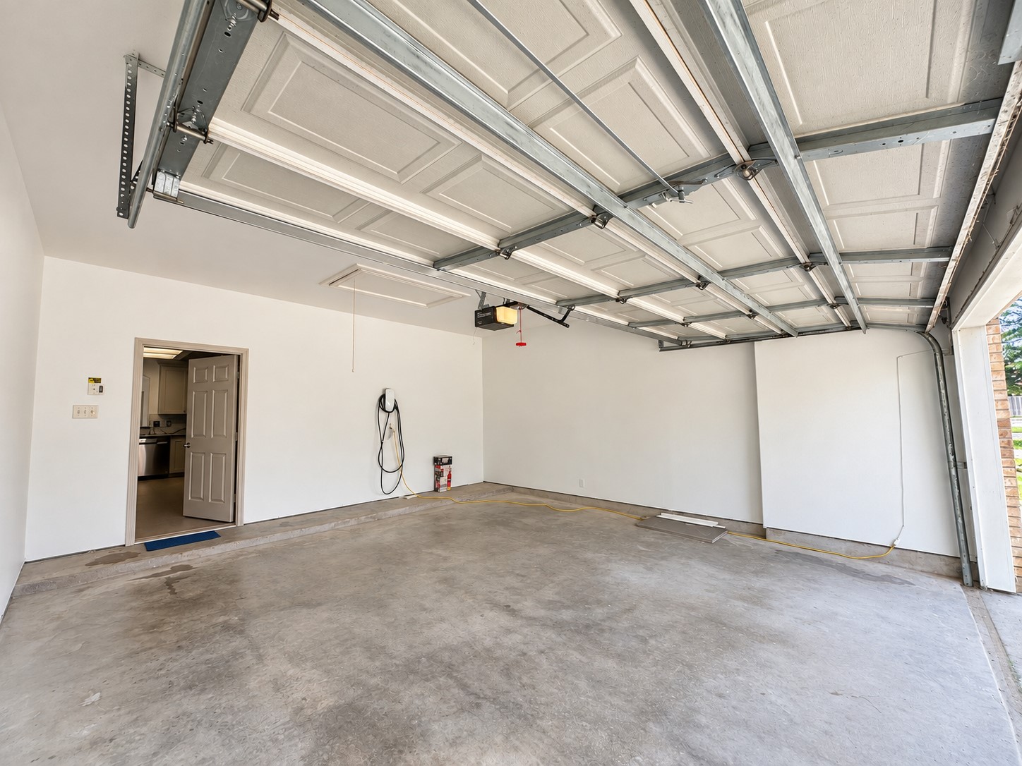 Garage with a Tesla charger.