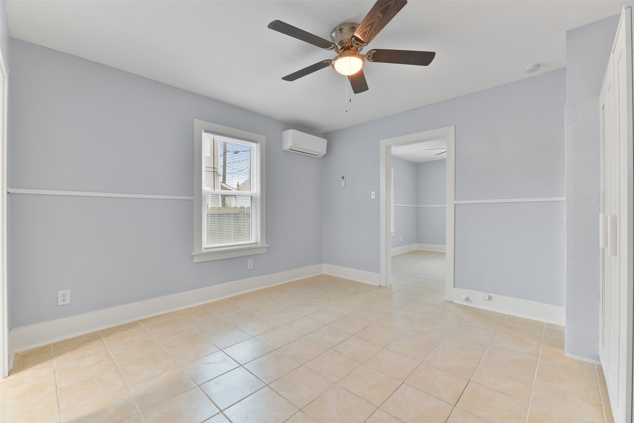 Unit B - Bedroom with mini-split AC system.