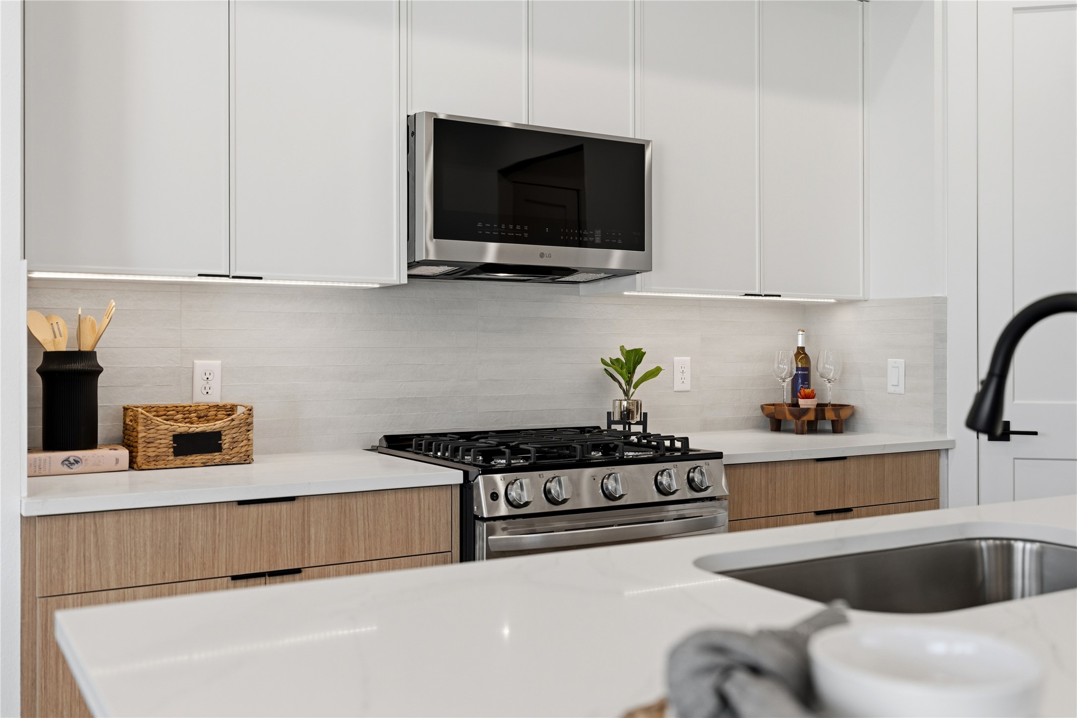 Stylish kitchen with sleek finishes, ample storage, and an oversized island for everyday living.