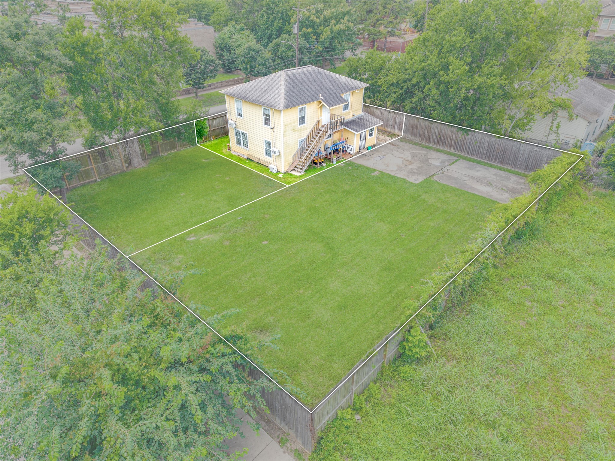 This listing is only for the duplex property and does not include any additional lots.