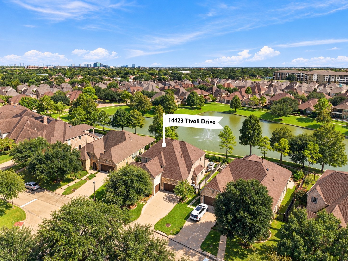 Beautifully positioned along the Terraces on Memorial community lake, offering serene water views and an exceptional community
