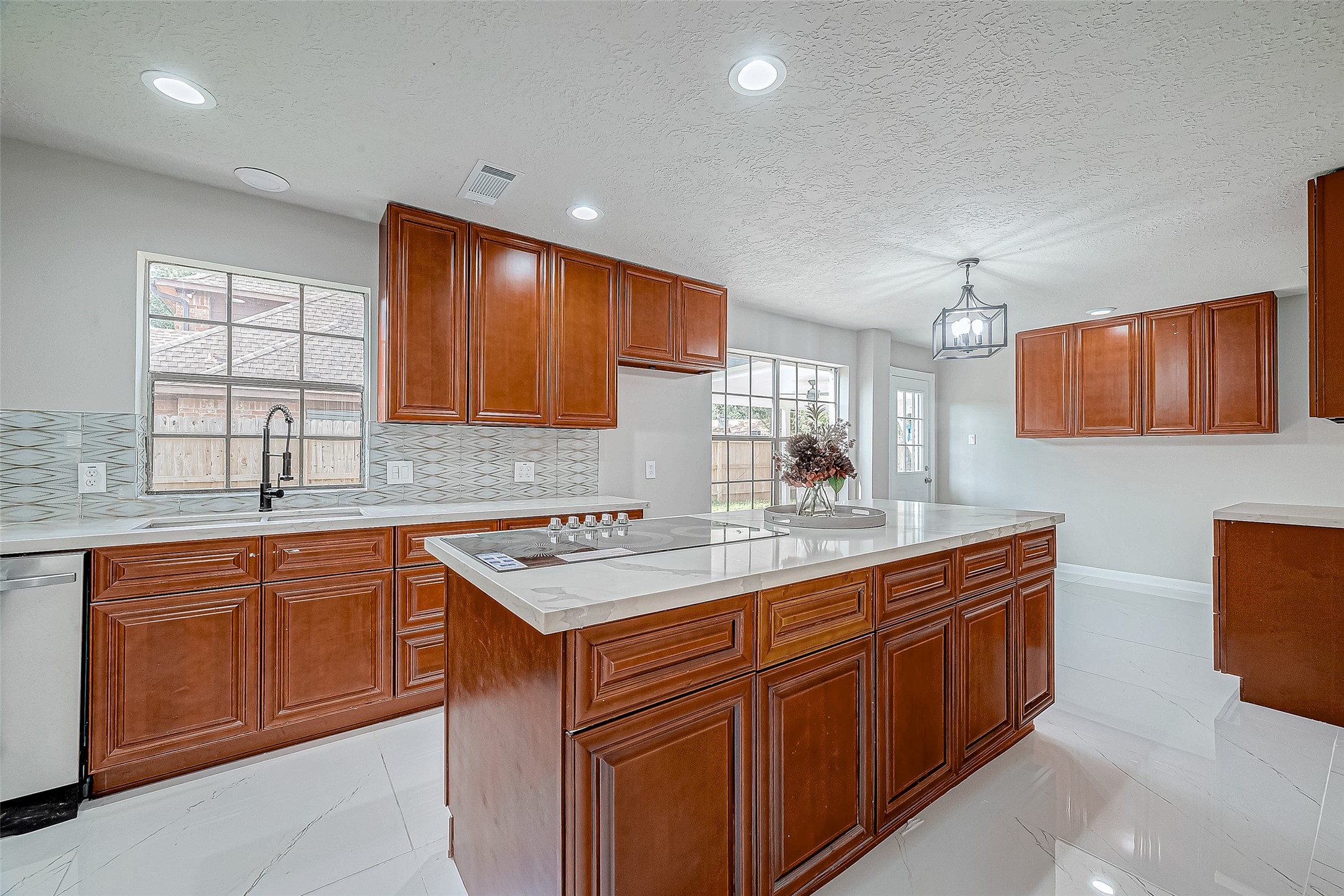 Elegant cabinetry, modern fixtures, and abundant natural lightperfect for culinary enthusiasts.