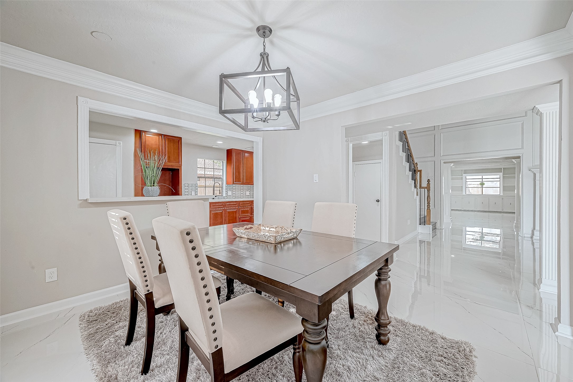 Dining Room includes a wooden dining table with upholstered chairs. Dining Room includes a wooden dining table with upholstered chairs.