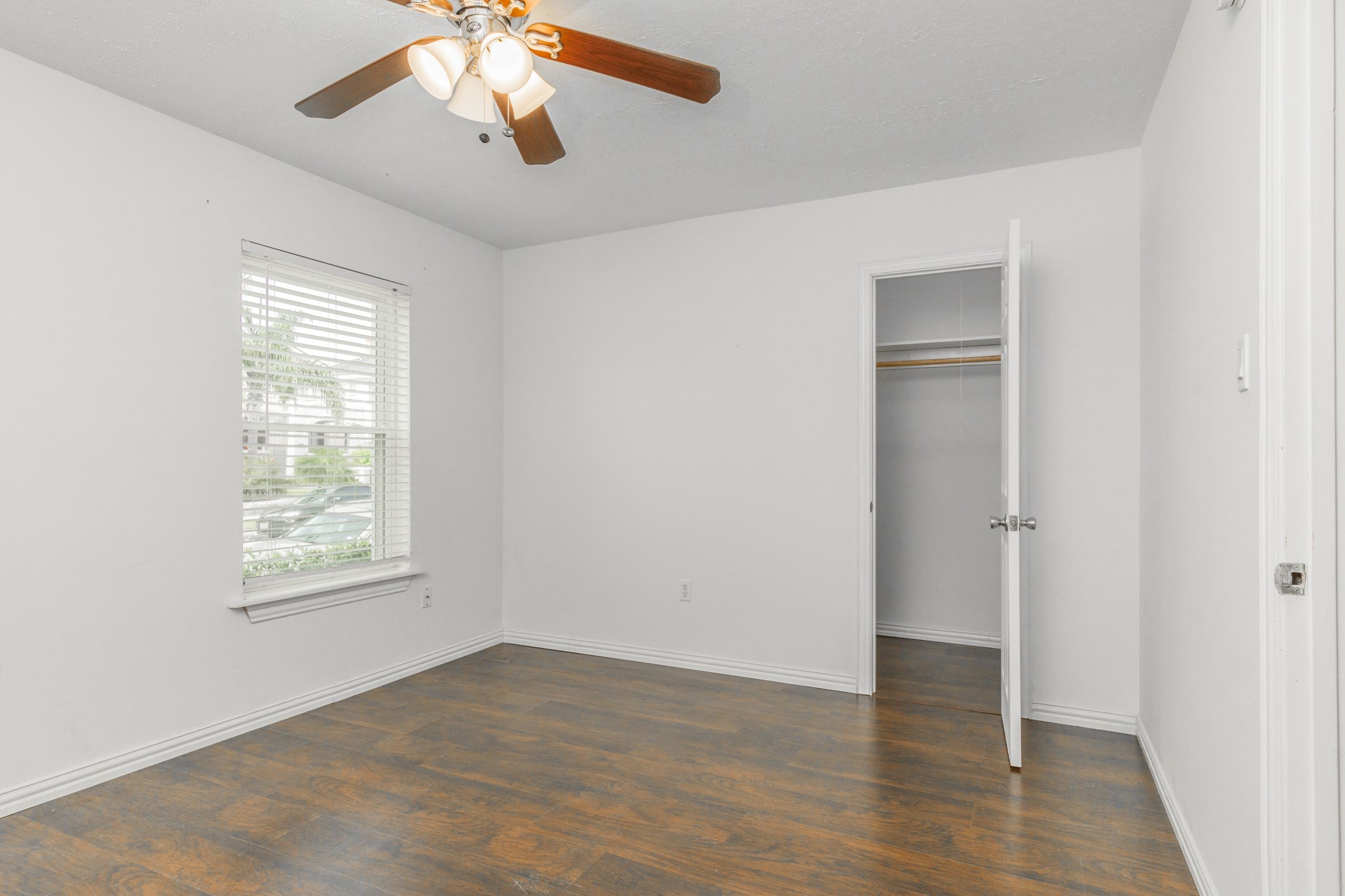 Spacious bedroom. **Listing photos from unit 4, and bedroom flooring might be different.