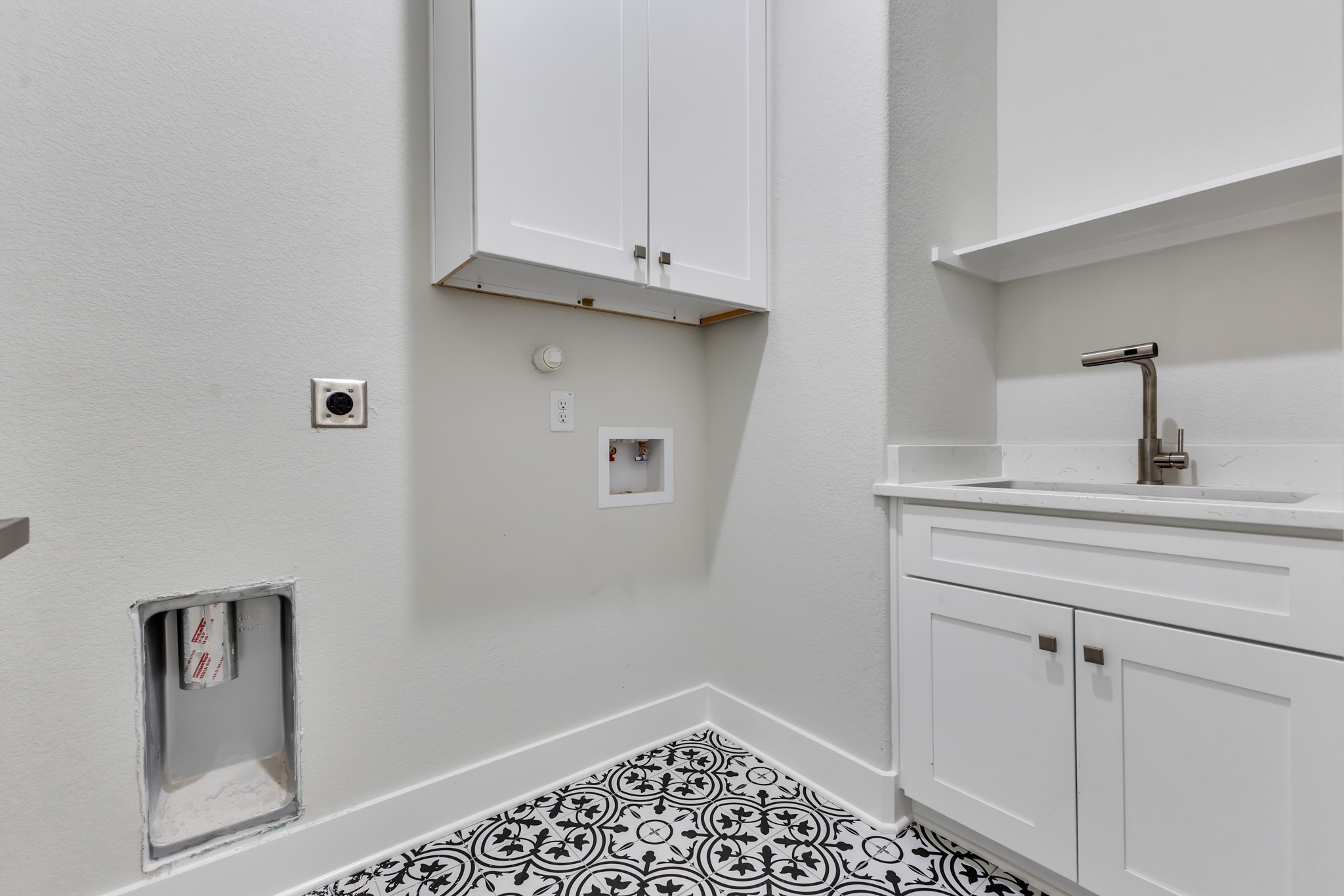 Laundry Room with Built-In Cabinets
