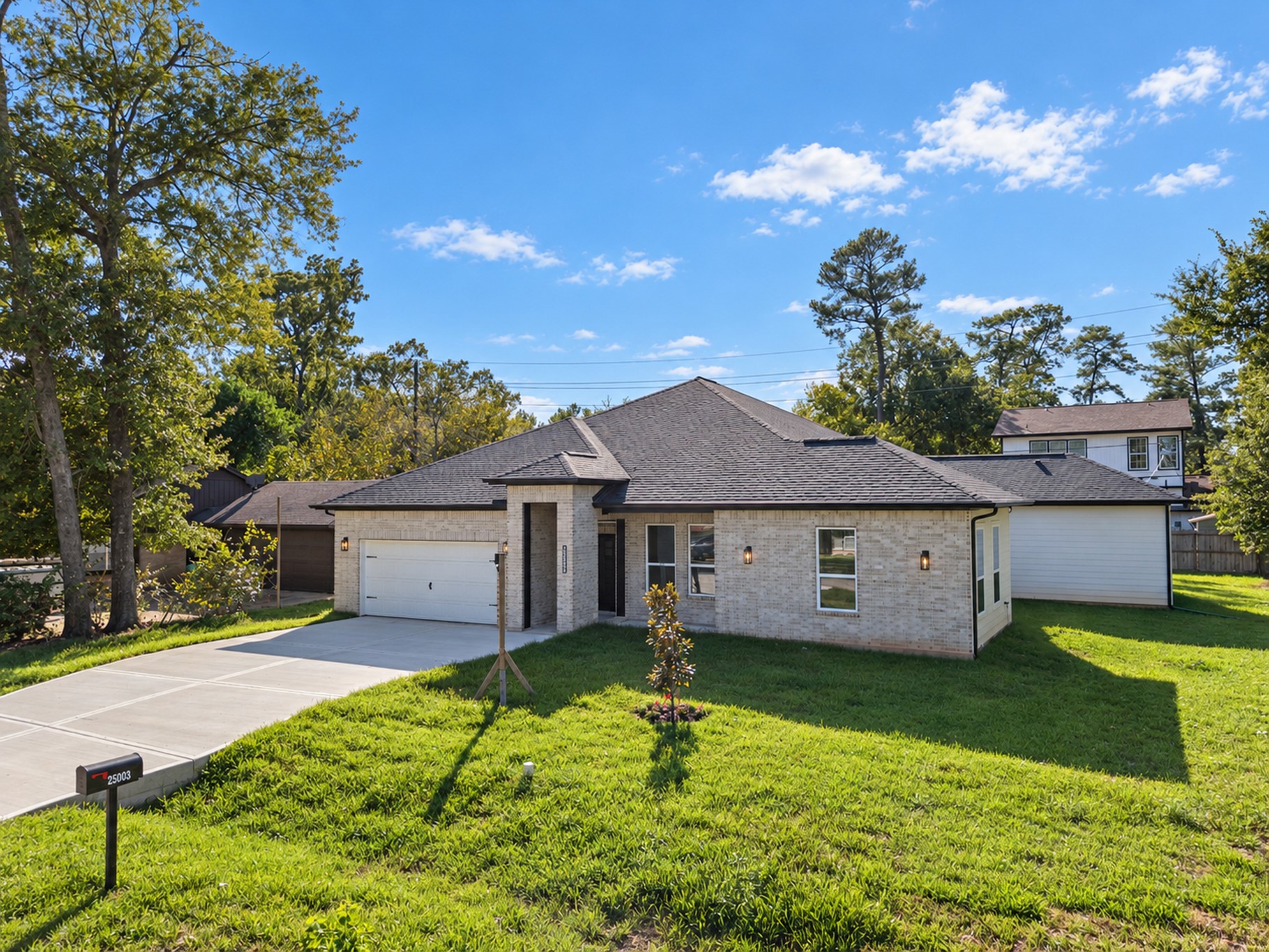 Front Exterior & Spacious Driveway