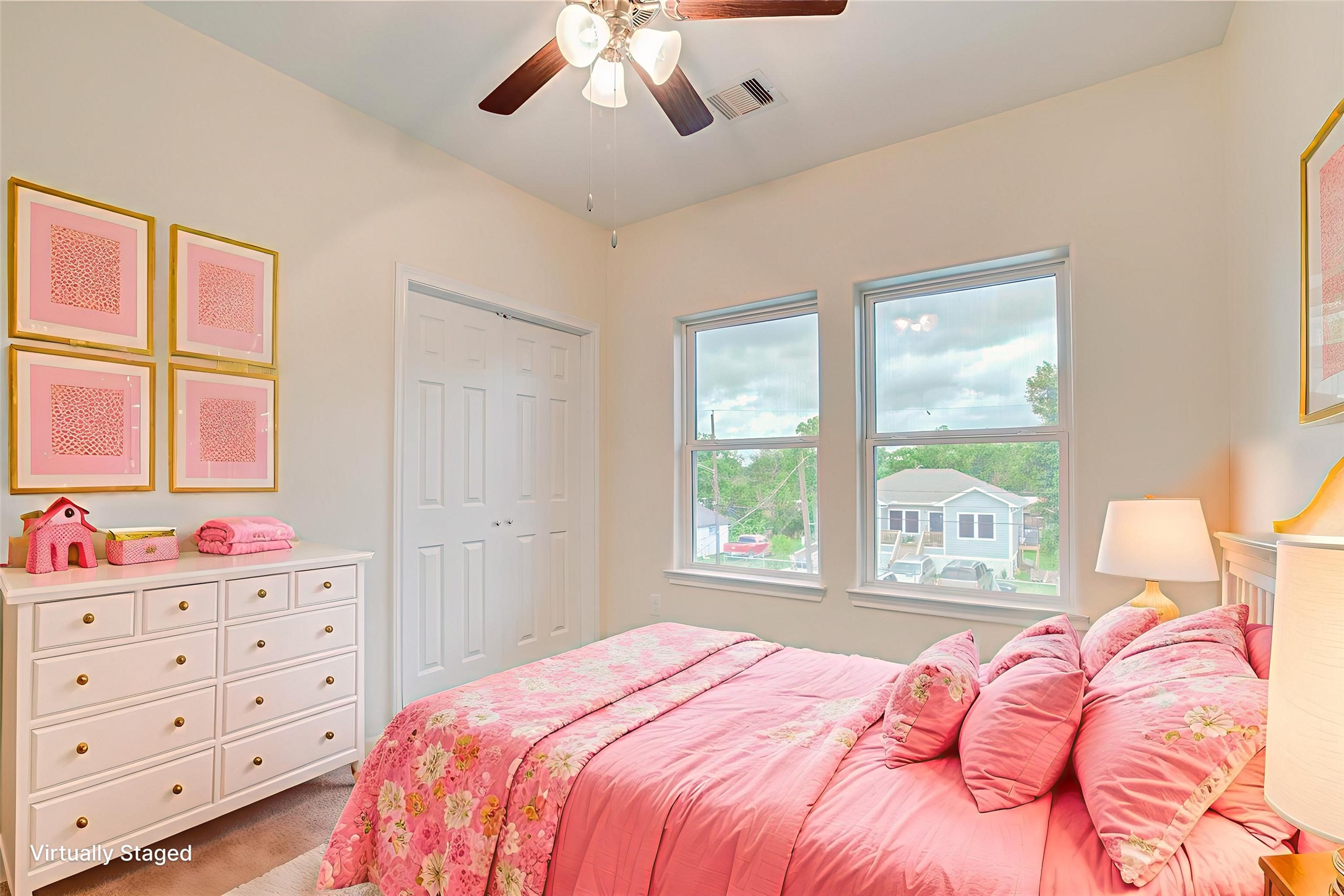 Third bedroom with abundant natural light from two large windows.