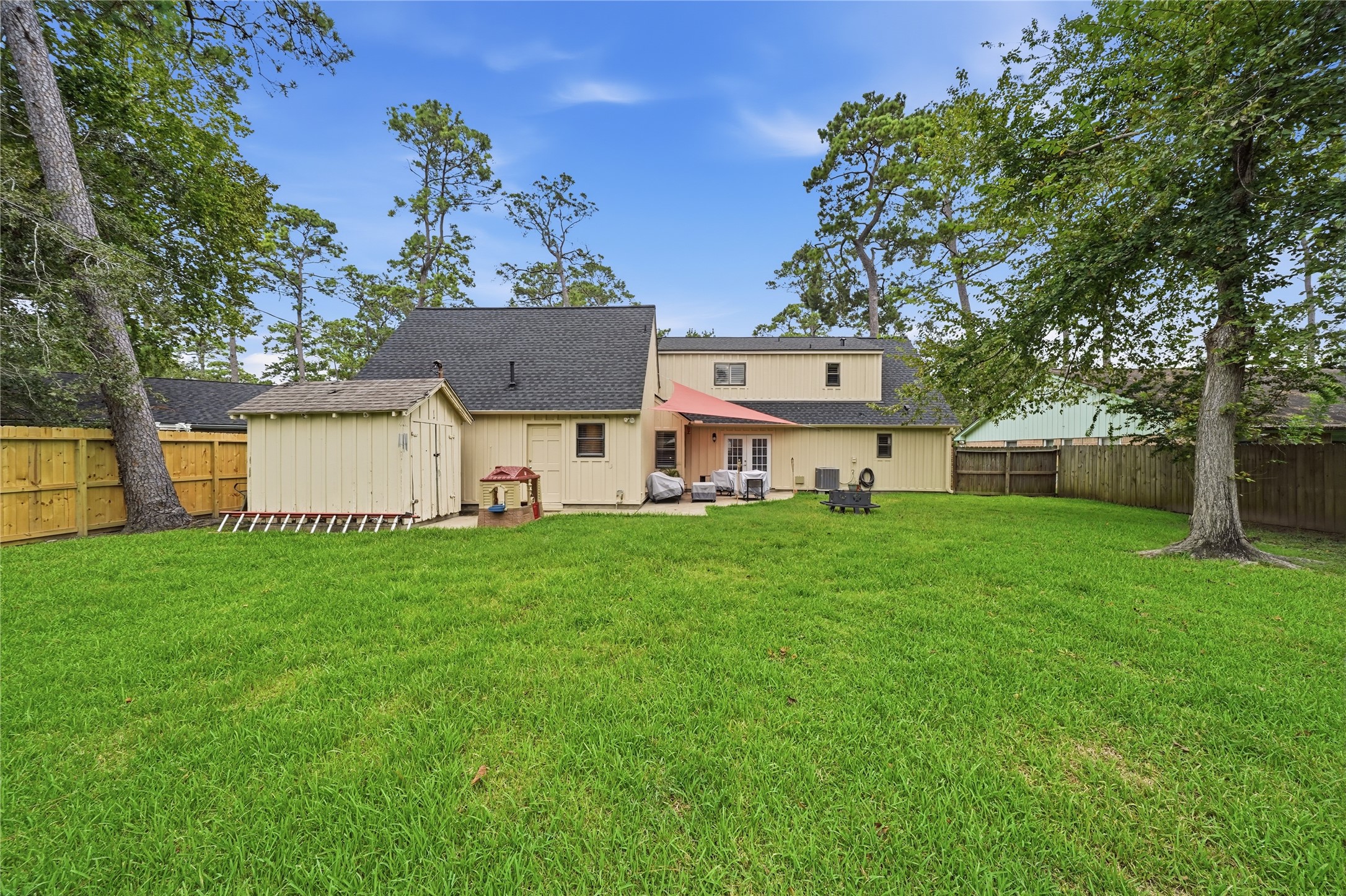 Massive backyard with a porch