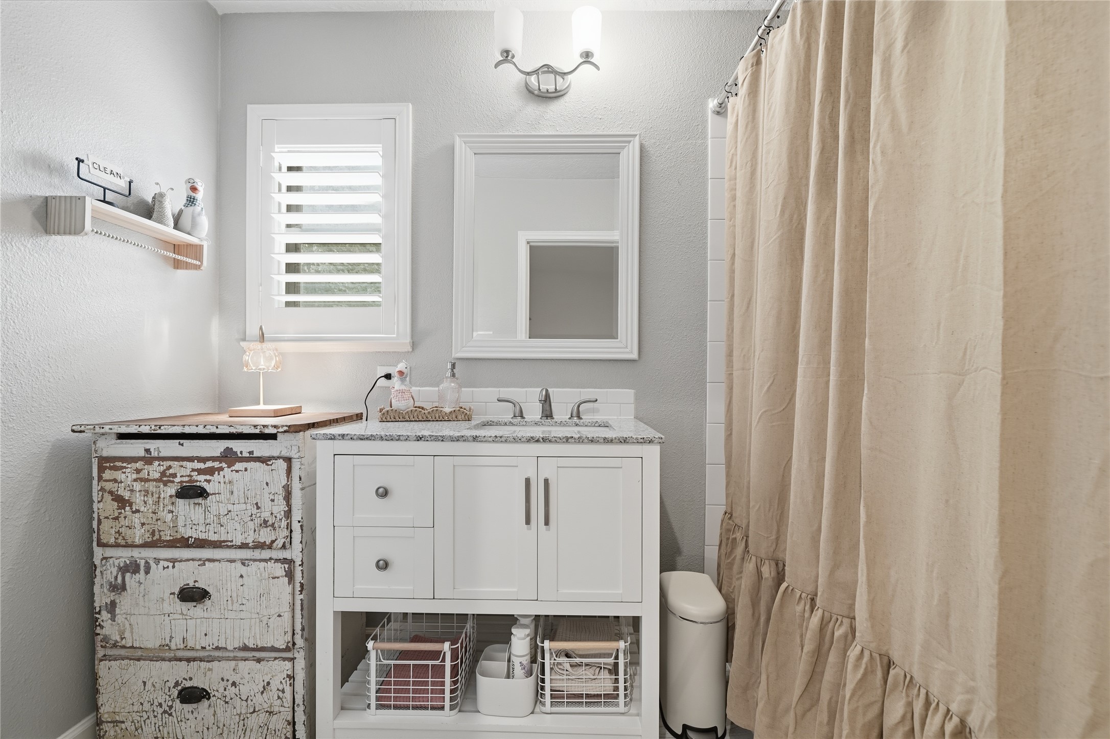 Guest bathroom upstairs with tb/shower combo