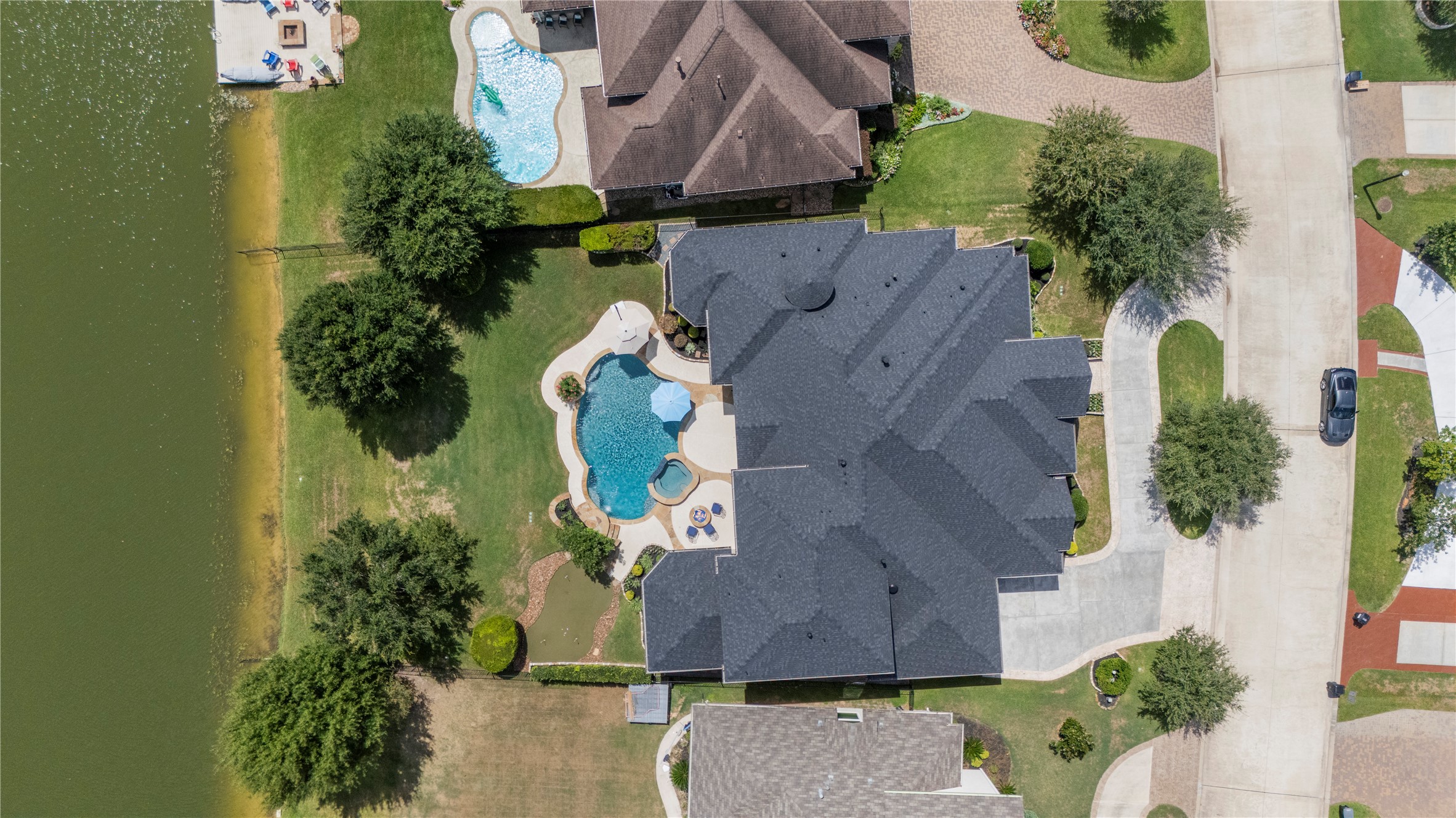 Note the shrubs and trees make the back yard relatively private, new roof last summer. Note the shrubs and trees make the back yard relatively private, new roof last summer.