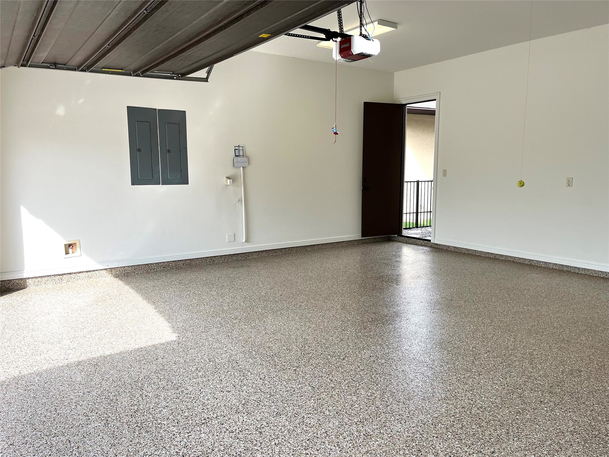 Both garages with new Polyaspartic  coating in 2025