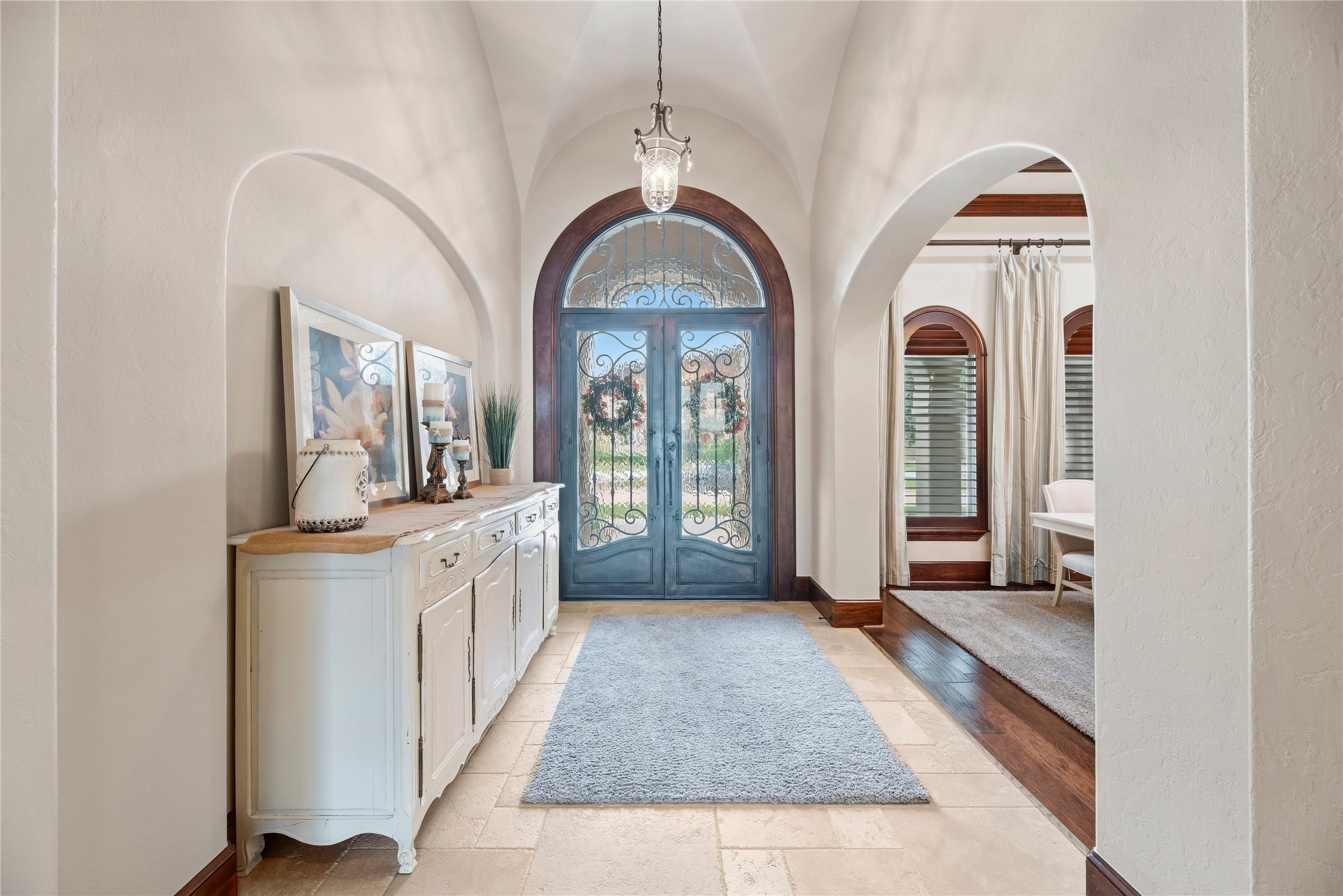 Elegant foyer with groin vault ceiling