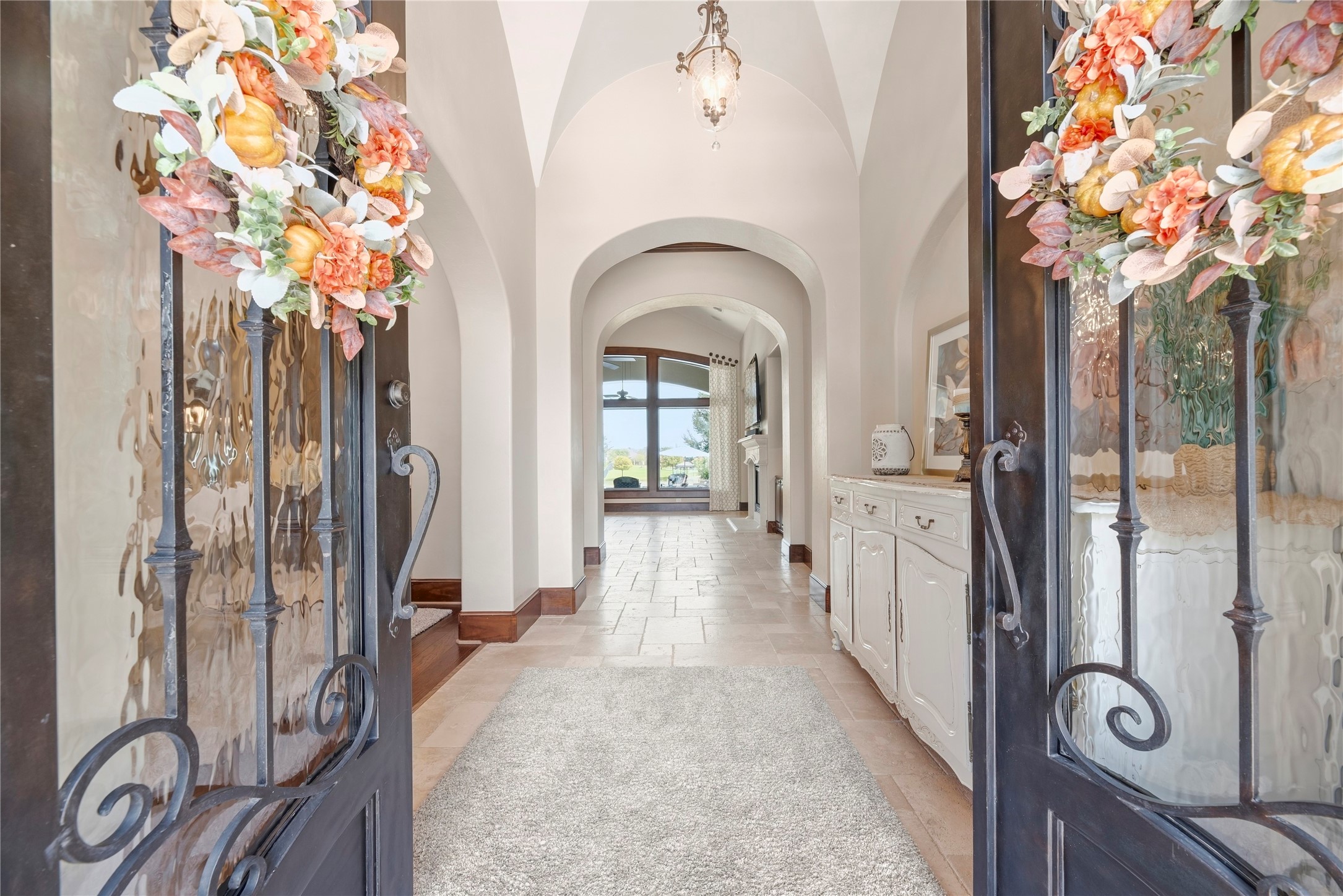 Enter through the iron and Flemish glass double doors, they make move in easy.