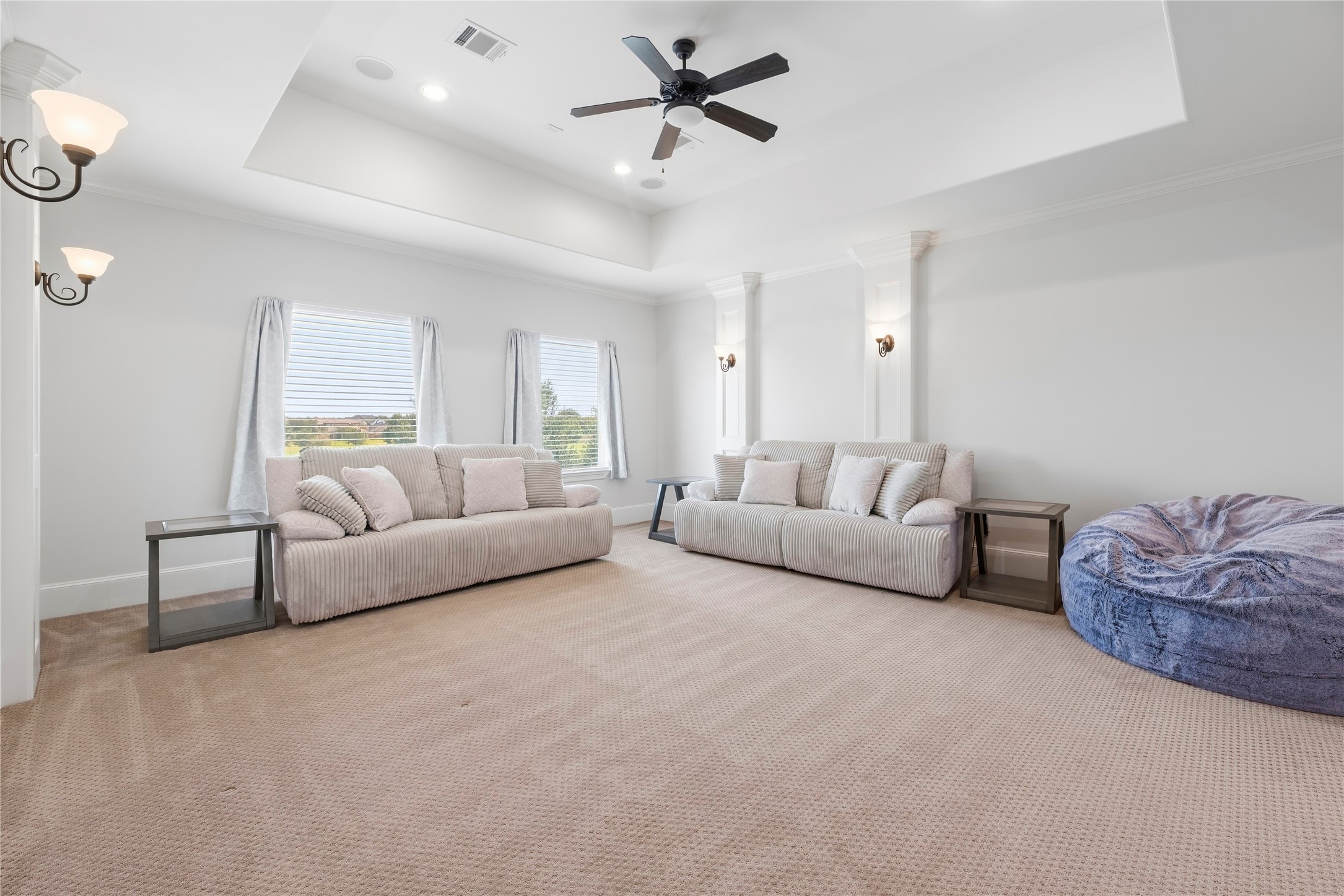Upstairs there is a large Media room, with room darkening curtains, could also be a game room