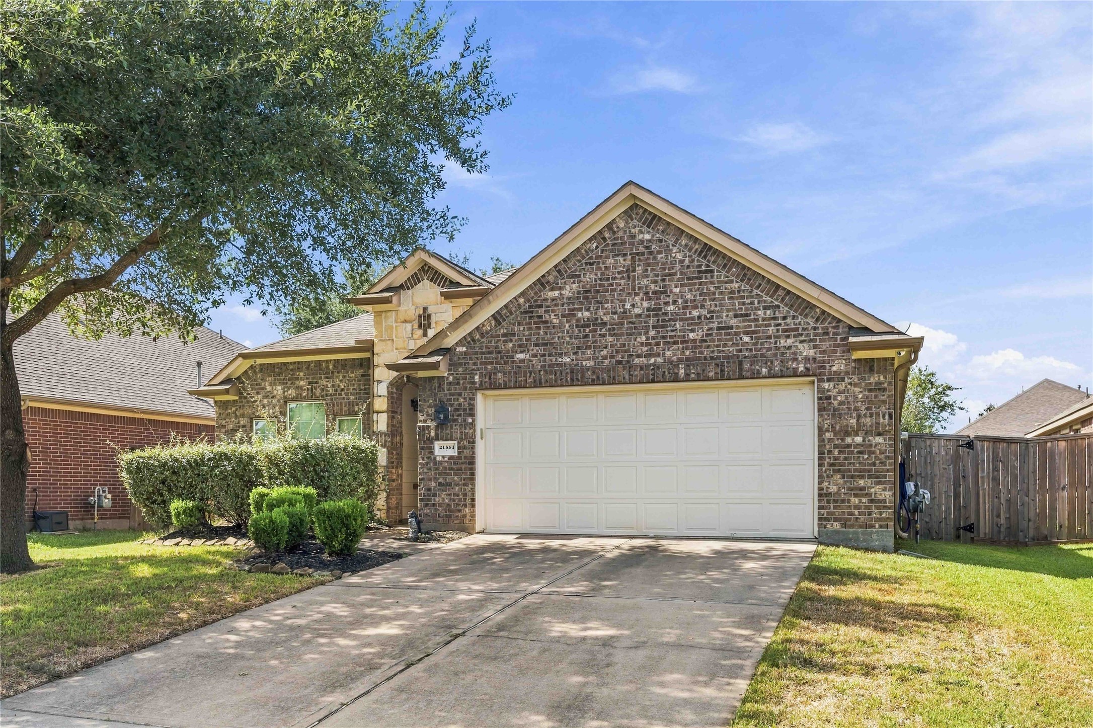 Two-car garage features a 3' extension, plus a wide driveway for extra parking.