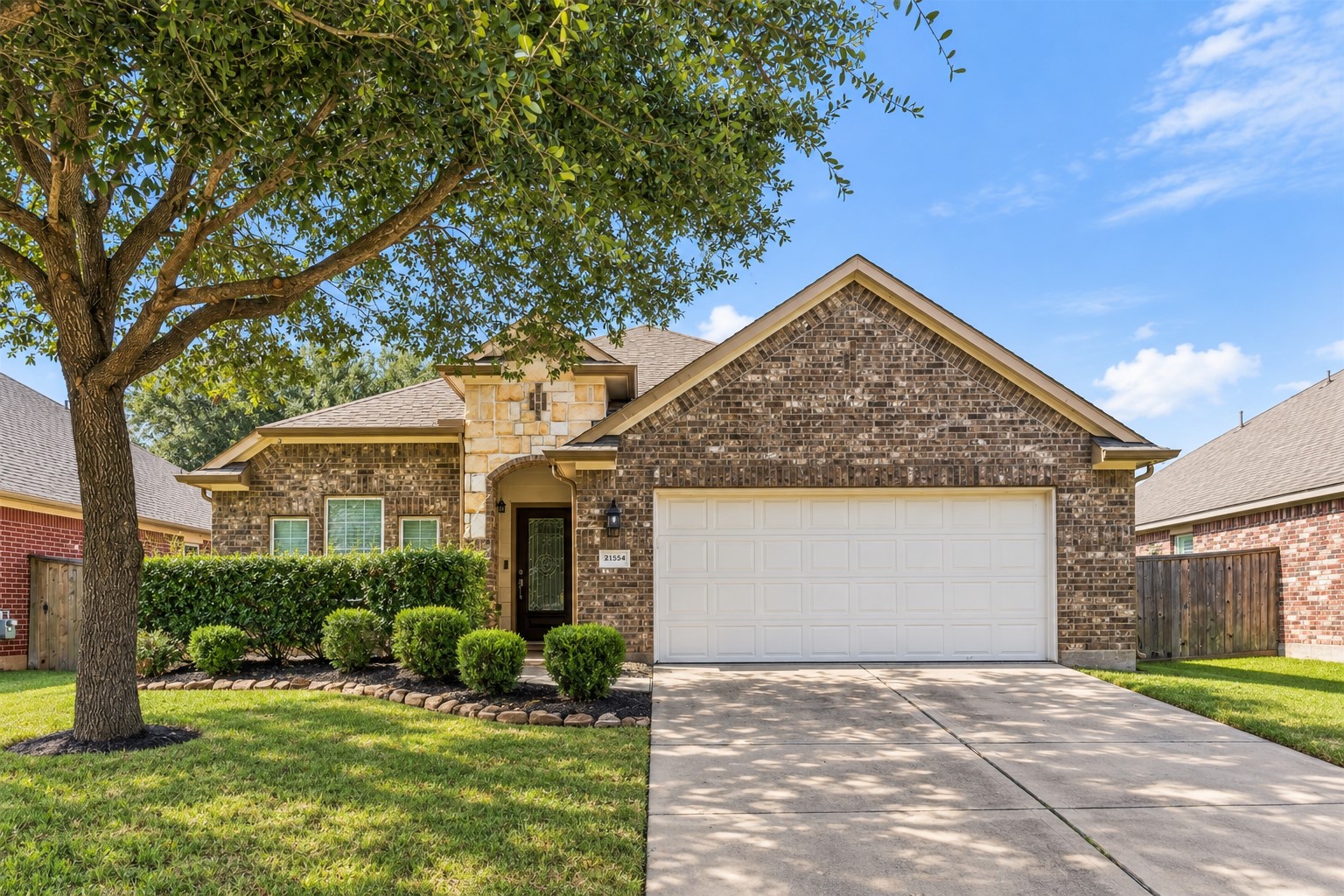 Welcome to 21554 Barrett Knolls! Charming brick home with mature shade tree and welcoming curb appeal. Welcome to 21554 Barrett Knolls! Charming brick home with mature shade tree and welcoming curb appeal.