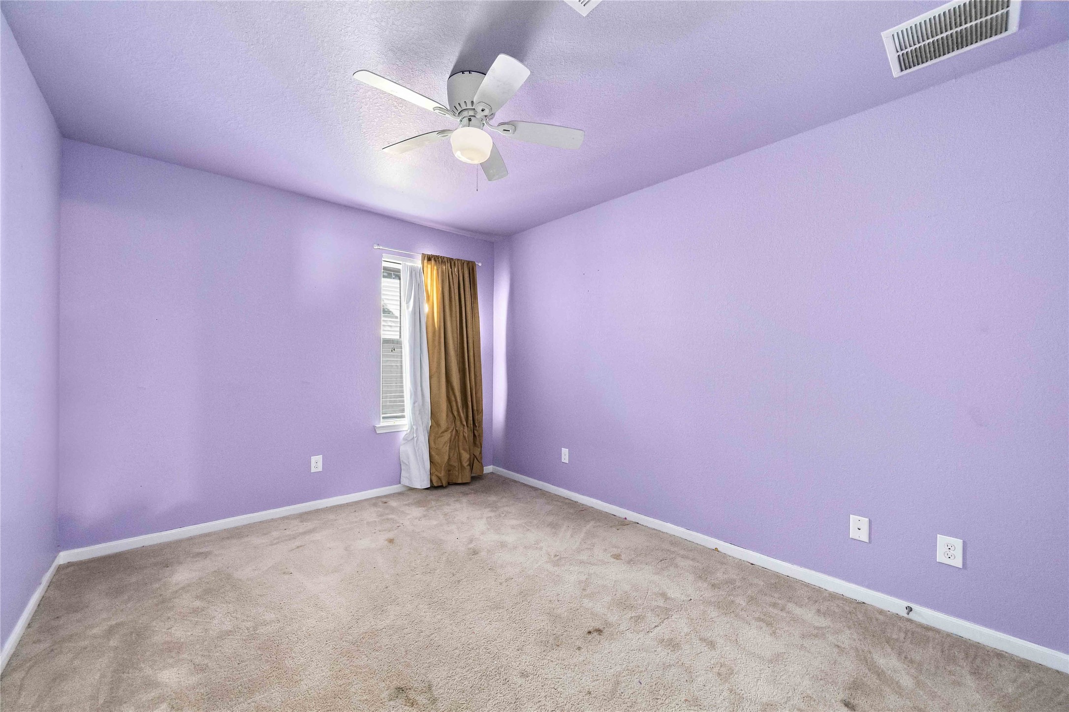The third bedroom offers  plenty of space and versatility.
