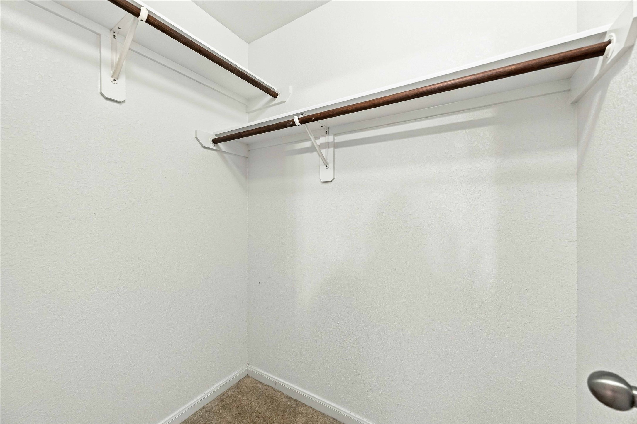 Generously sized bedroom closets provide plenty of storage space.