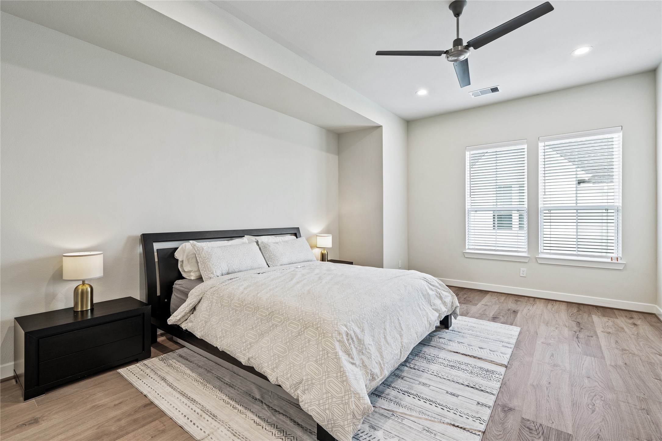 Representative photo showing the communitys model home primary bedroom. Layout and selections may vary.