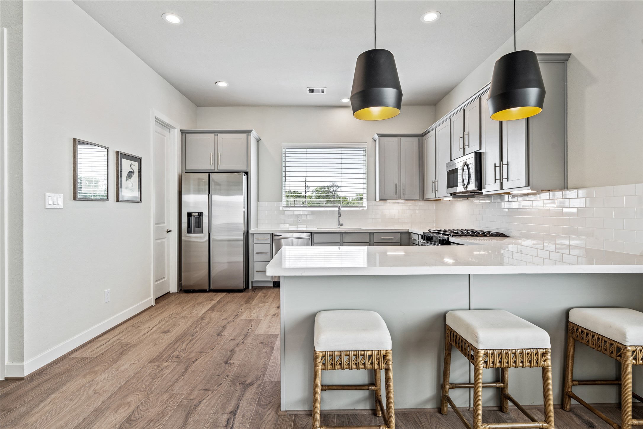 Representative photo showing the communitys model home kitchen. Layout and selections may vary.