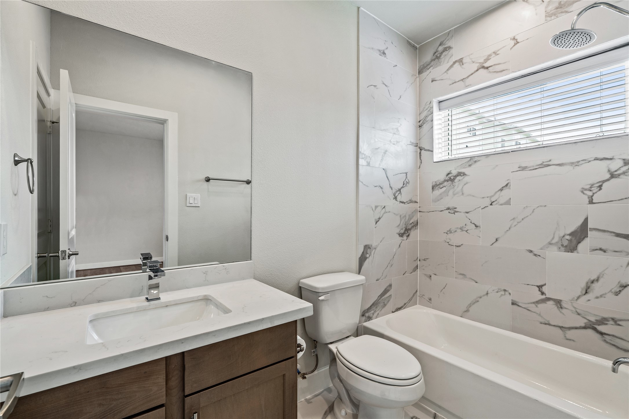 Representative photo showing the communitys model home secondary bathroom. Layout and selections may vary.